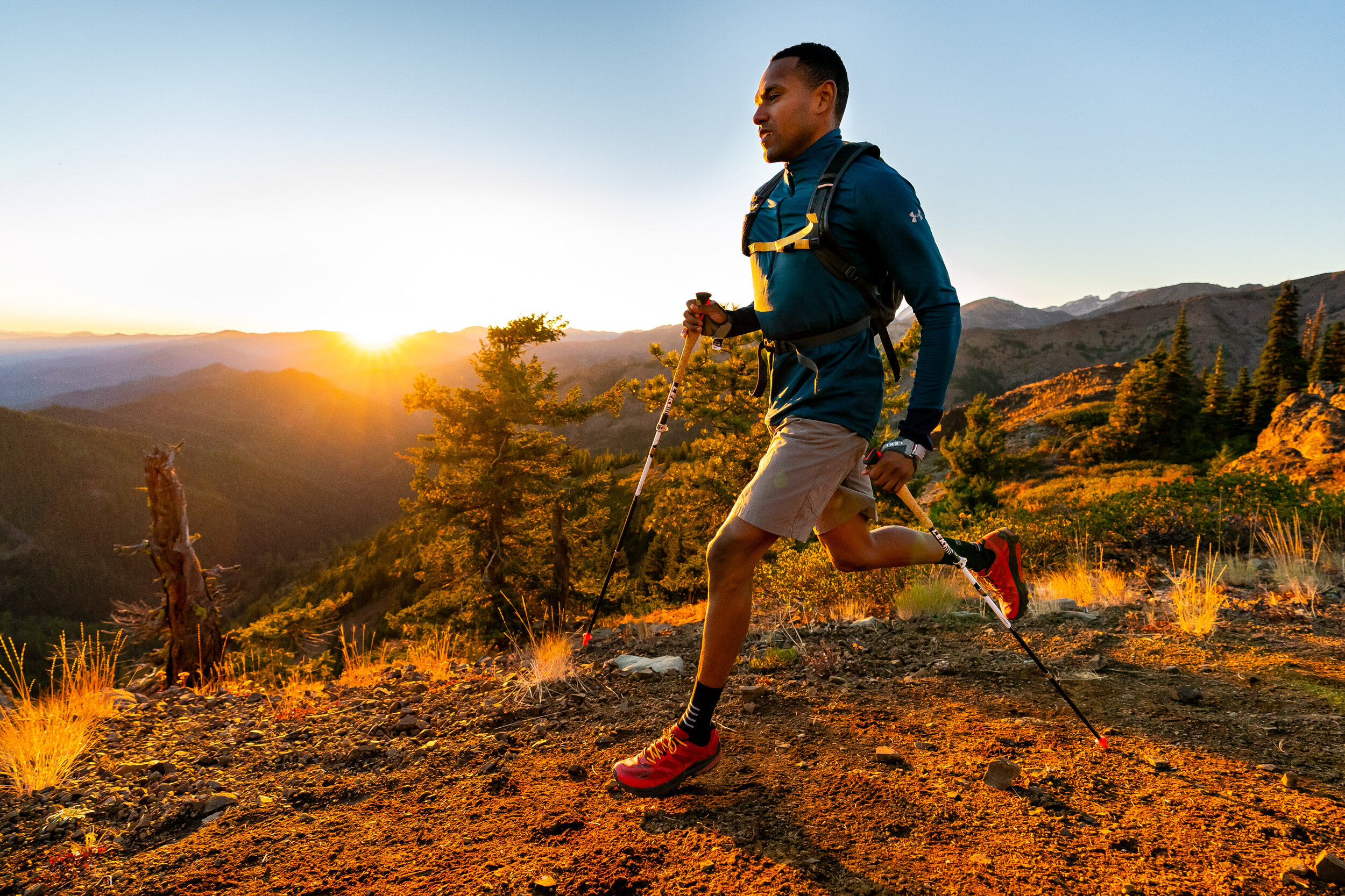  Lifestyle: Tim Cummings and Ariel Gliboff trail running on the Iron Bear trail in early Autumn, Central Cascades, Washington 