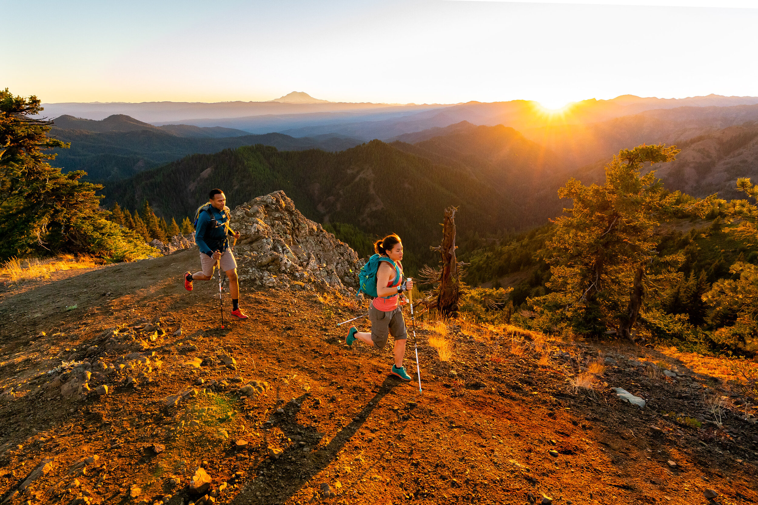  Lifestyle: Tim Cummings and Ariel Gliboff trail running on the Iron Bear trail in early Autumn, Central Cascades, Washington 