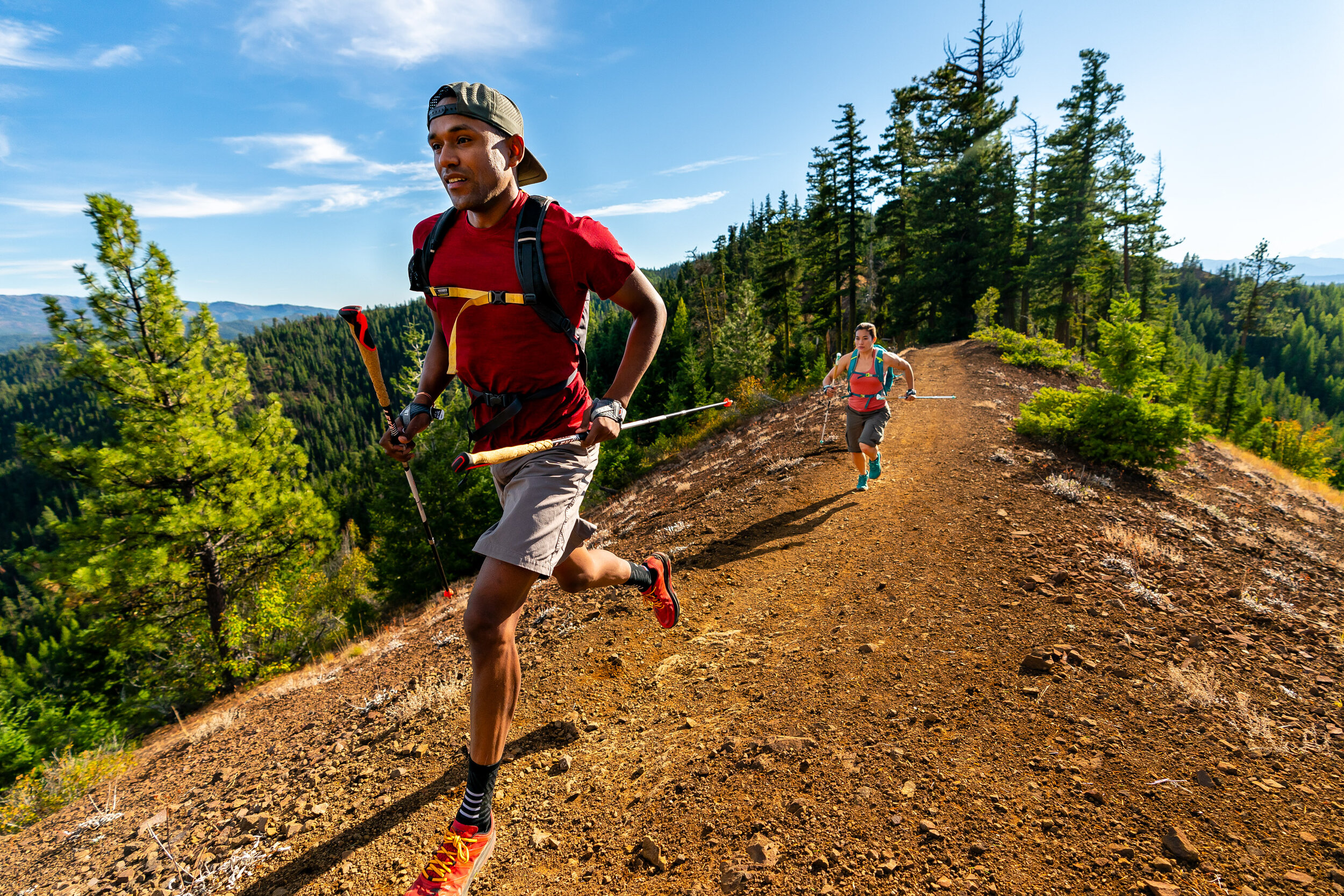  Lifestyle: Tim Cummings and Ariel Gliboff trail running on the Iron Bear trail in early Autumn, Central Cascades, Washington 