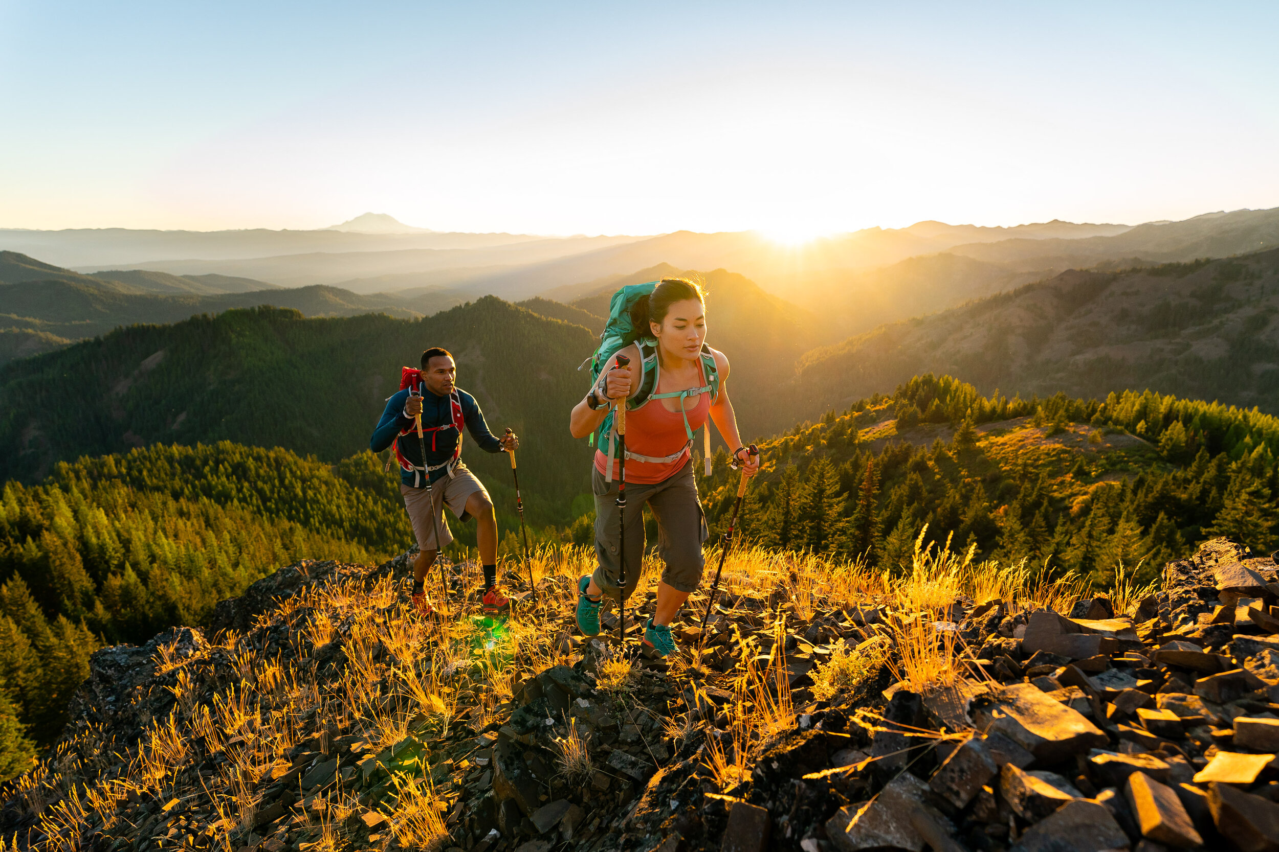  Lifestyle: Tim Cummings and Ariel Gliboff trail running on the Iron Bear trail in early Autumn, Central Cascades, Washington 