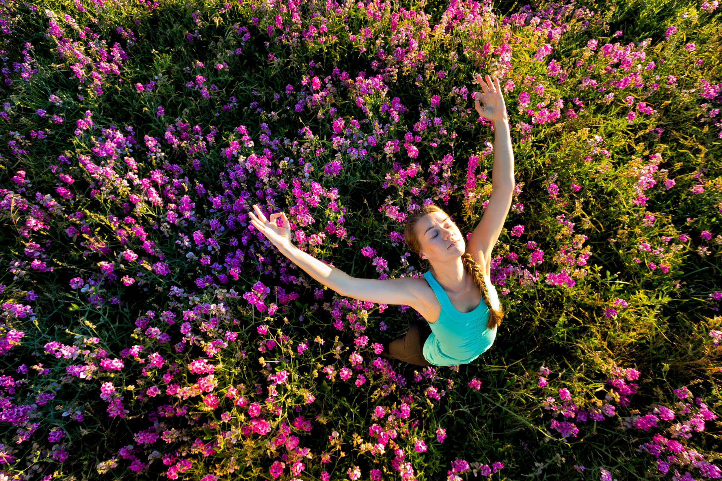  Lifestyle: Kirsten Dahlhauser practicing yoga in a meadow of wildflowers at Discovery Park, Seattle 