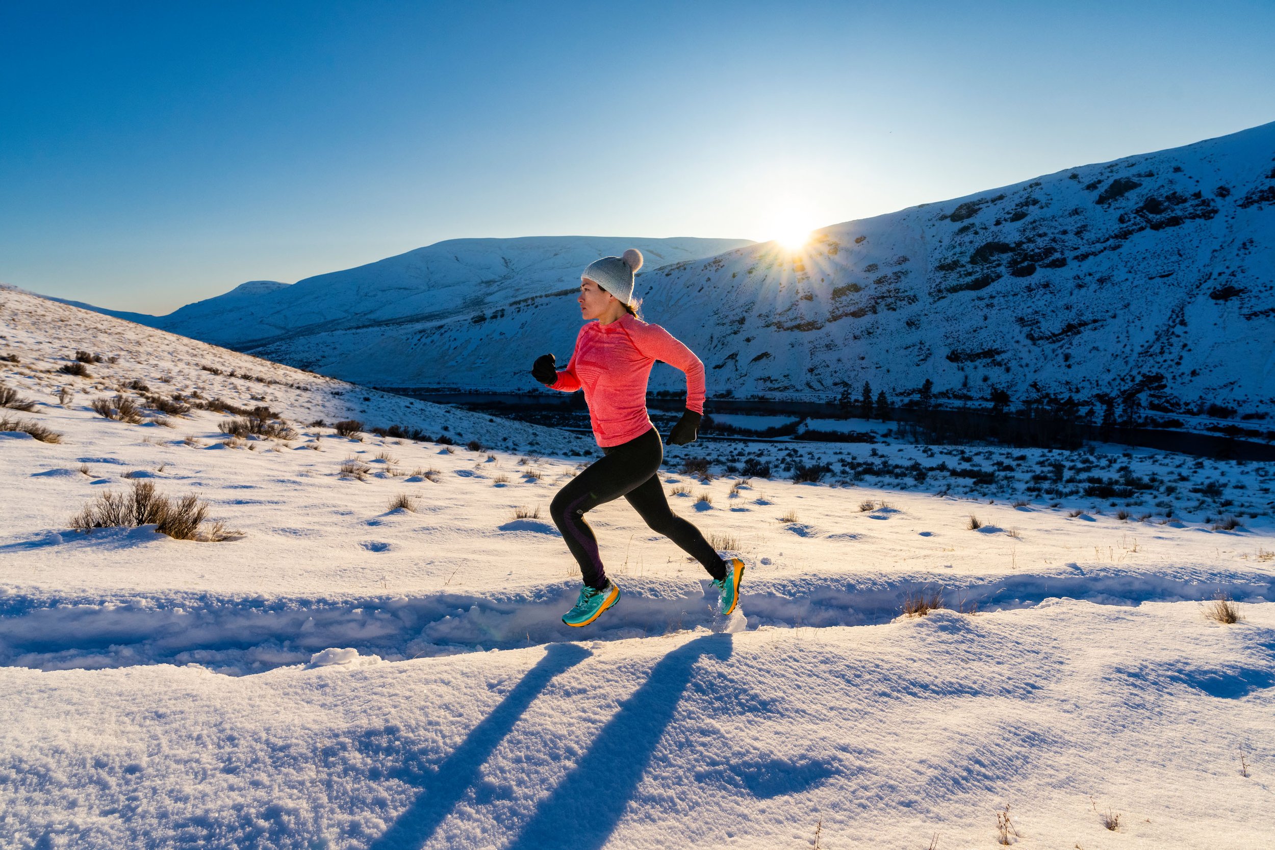  Adventure: Ariel Gliboff trail running in the snow on a sunny day in Yakima Canyon, Eastern Washington 