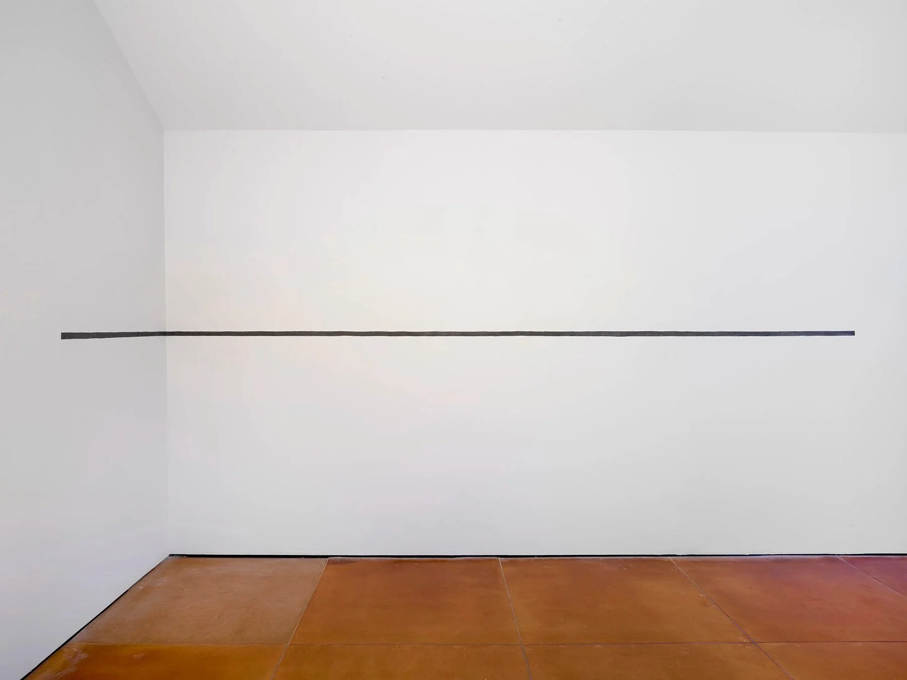   20 foot Line , 2018/2024, lead embedded in sheetrock wall, 1 1/2” x 20’ 2”, installation view,  Time•Line , Josh Pazda Hiram Butler, Houston, TX, November 16, 2024 - February 15, 2025.&nbsp; 