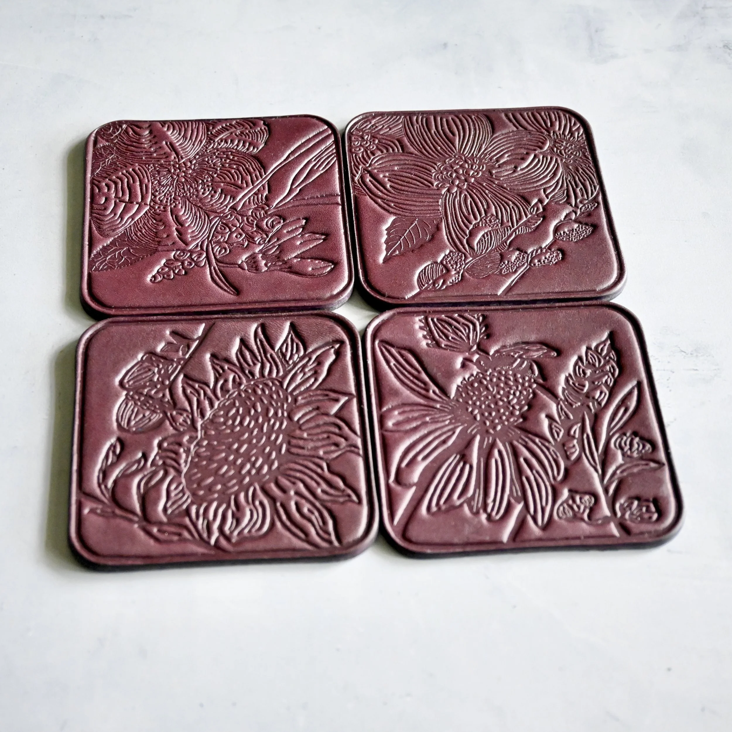 Plum Botanical Leather Coasters .JPG