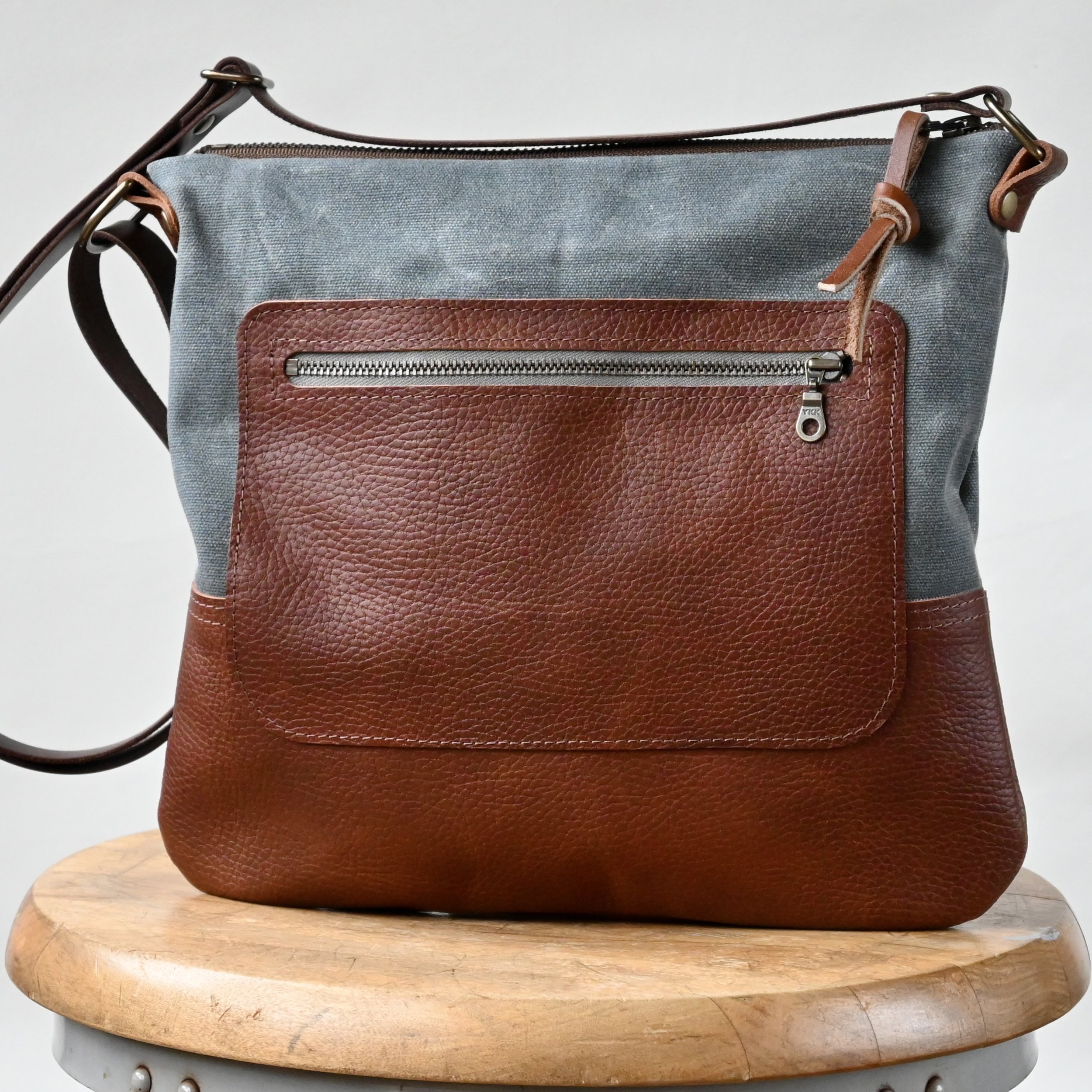 Stitch & Rivet waxed canvas and leather crossbody day bag in slate blue  gray — Stitch & Rivet
