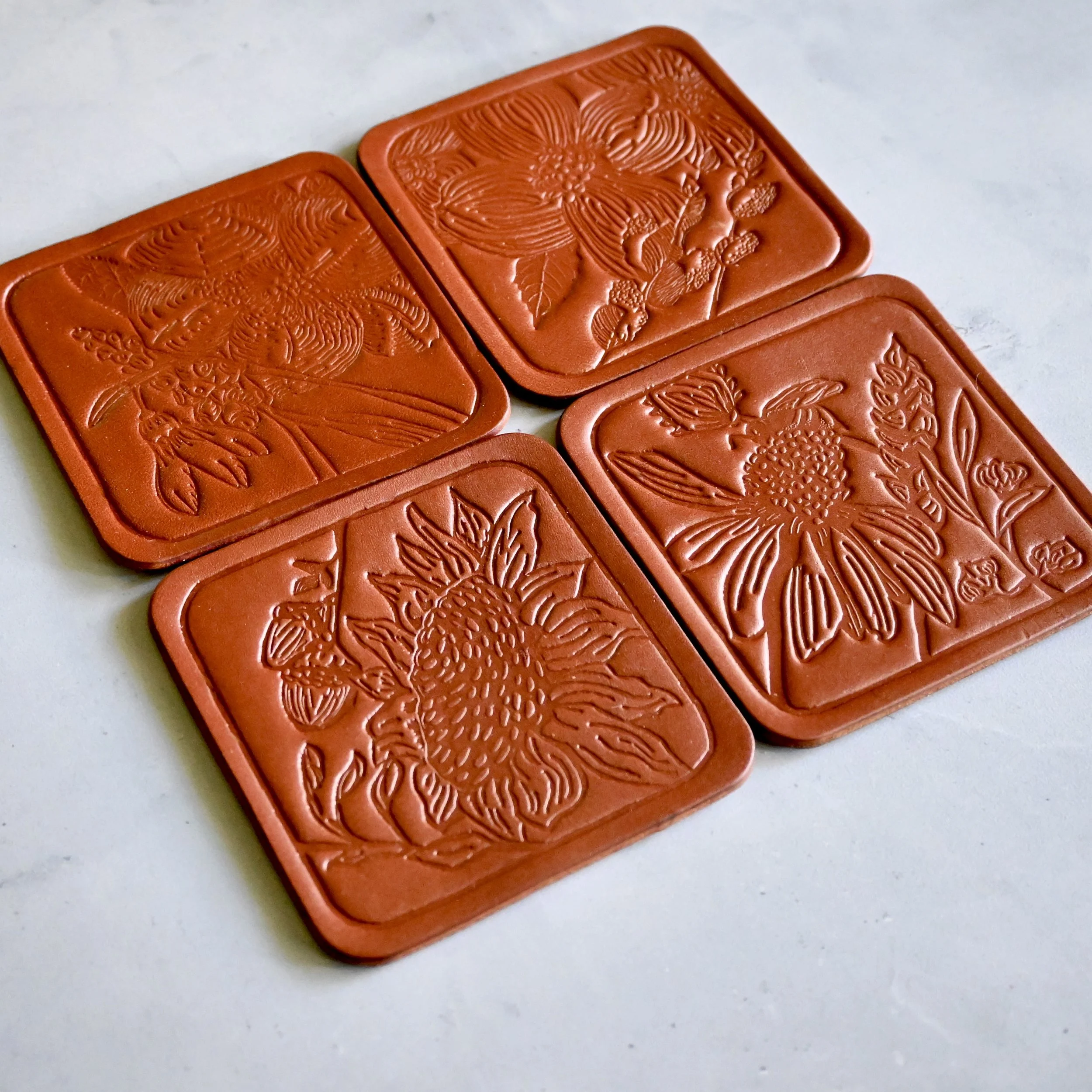 Stitch & Rivet Brown Leather Botanical Coasters.JPG