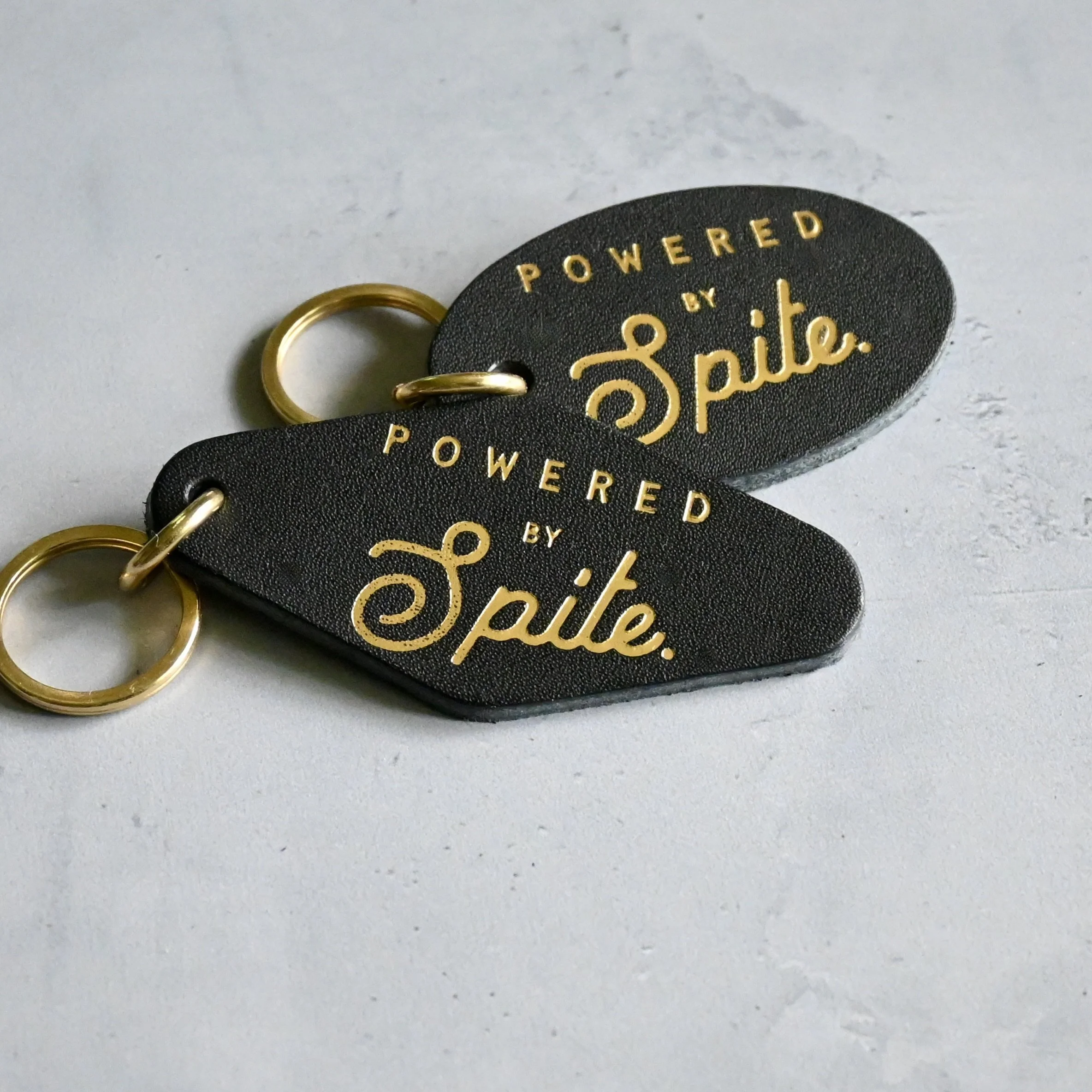 Powered By Spite Leather Keychain.JPG