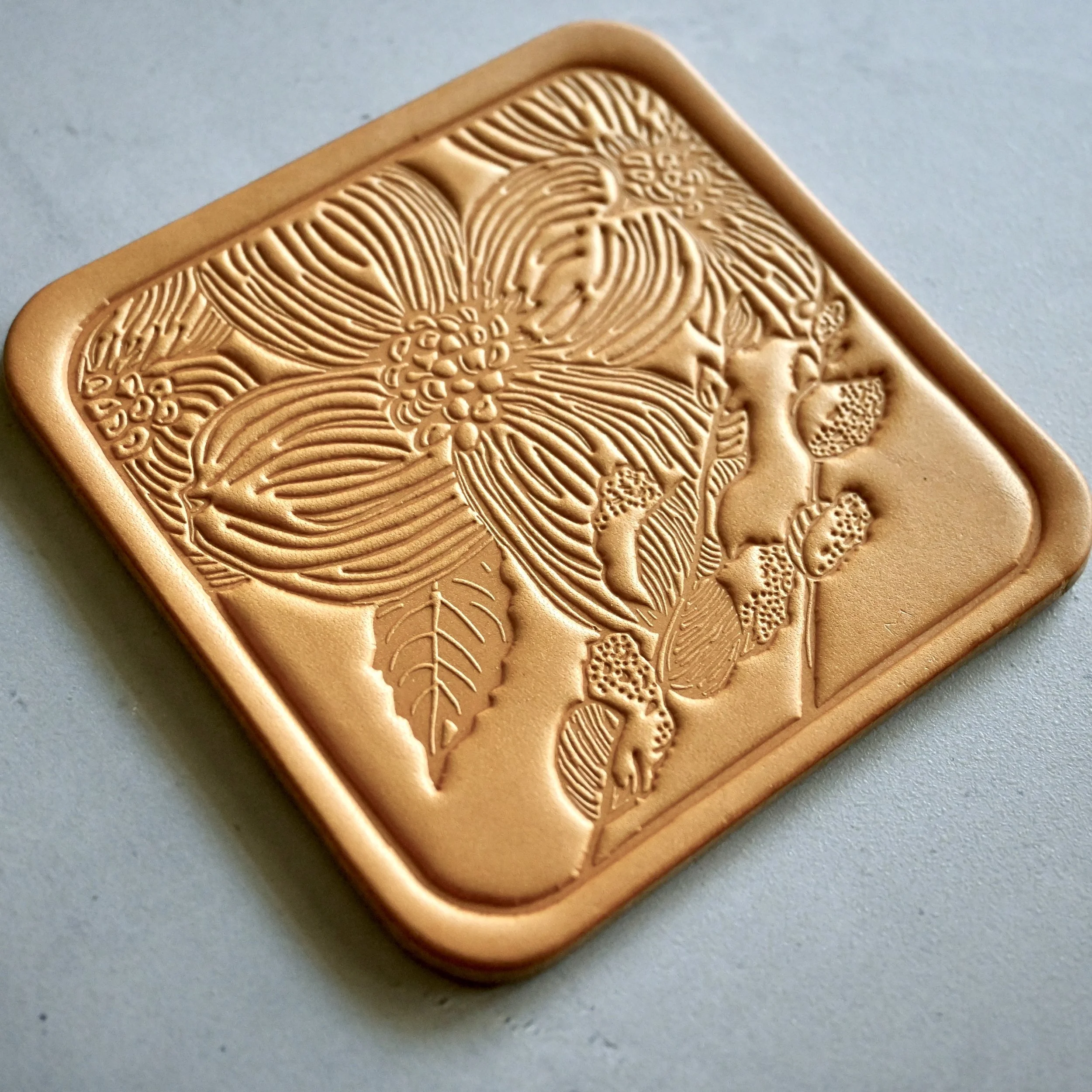 Leather Coaster with dogwood and pussywillow .JPG