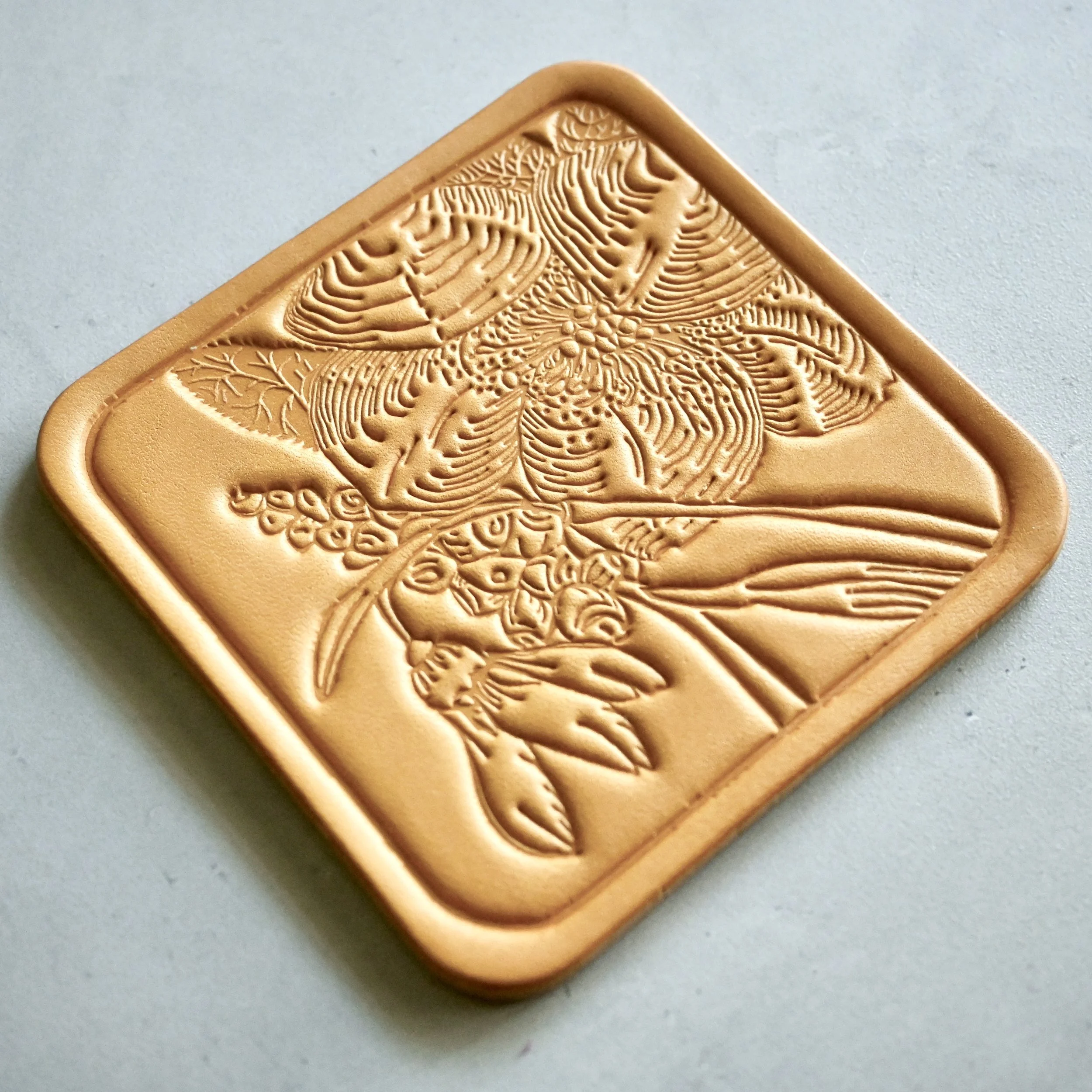 Leather Coaster with hellebore and snowdrop.JPG