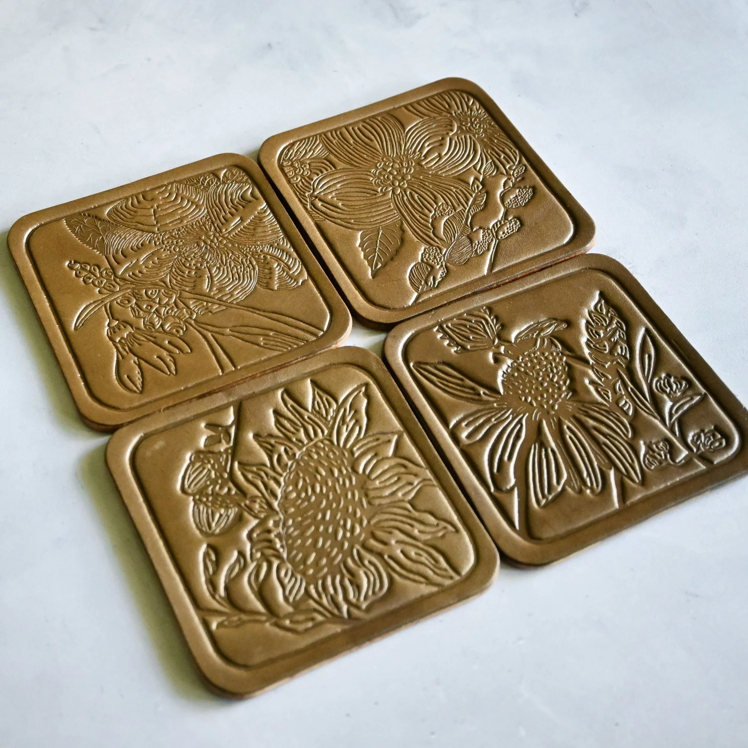 Olive Green Leather Coasters with Four Seasons Botanical design.JPG