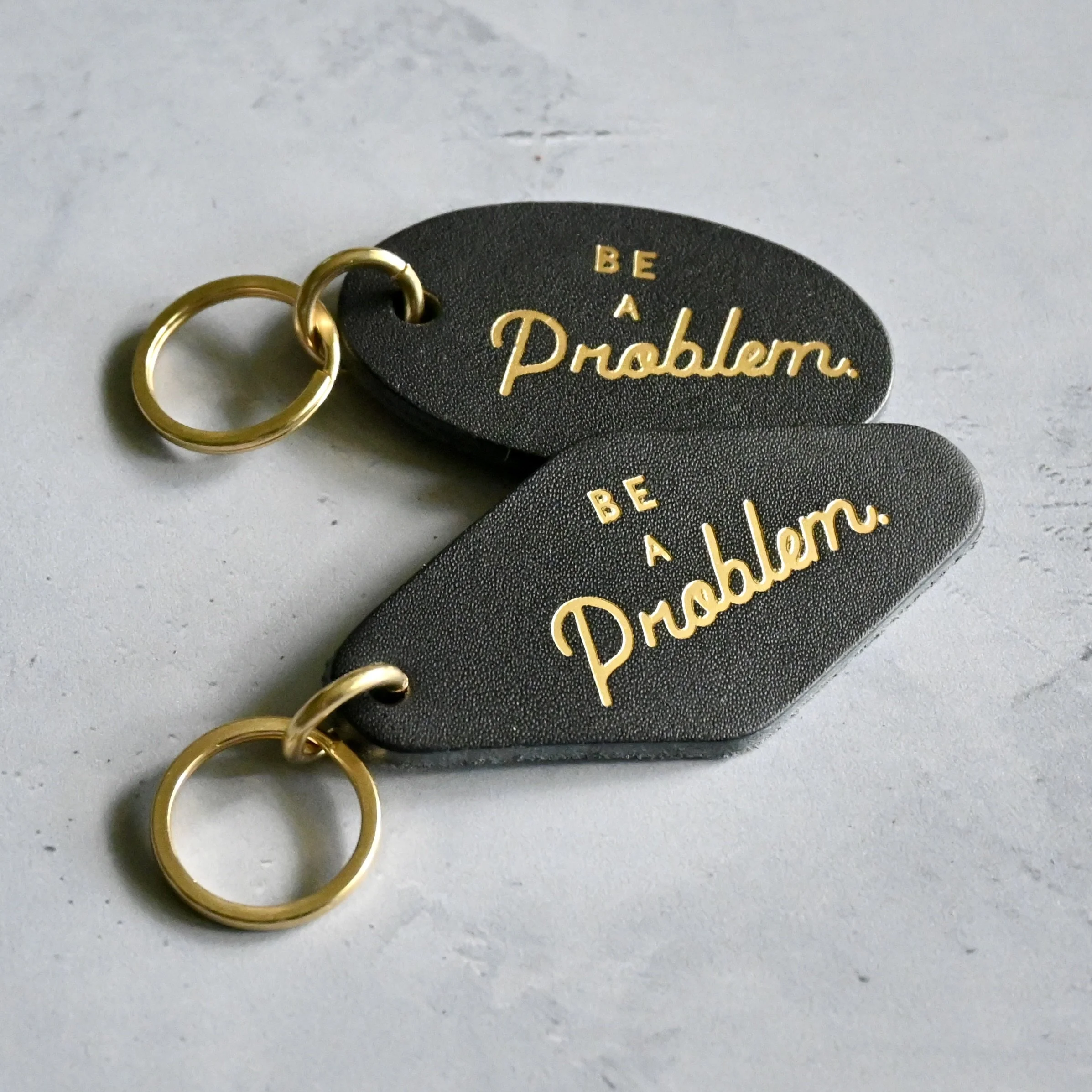 Be A Problem Leather Keychain.JPG