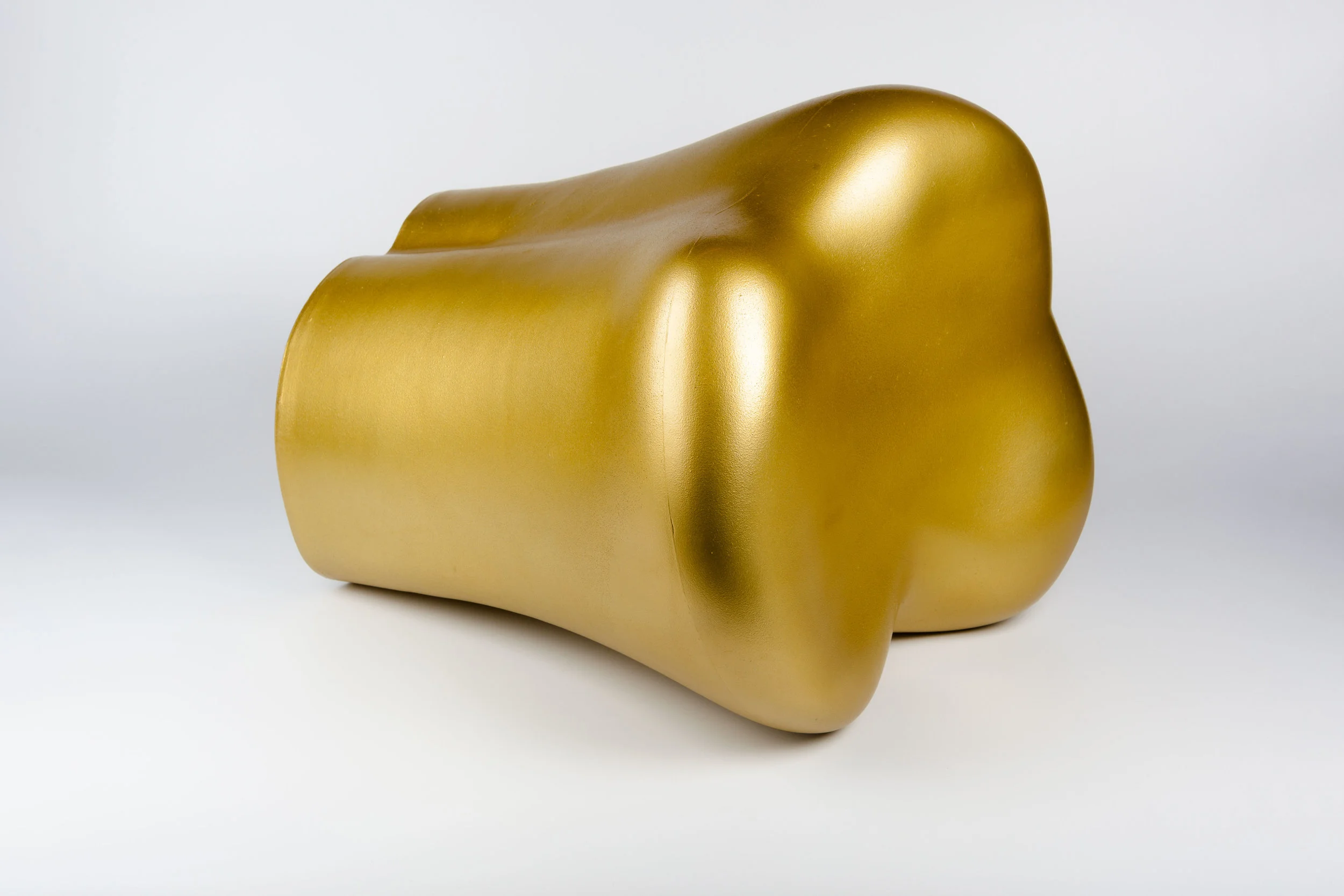 Starck Stool in a shape of a gold tooth