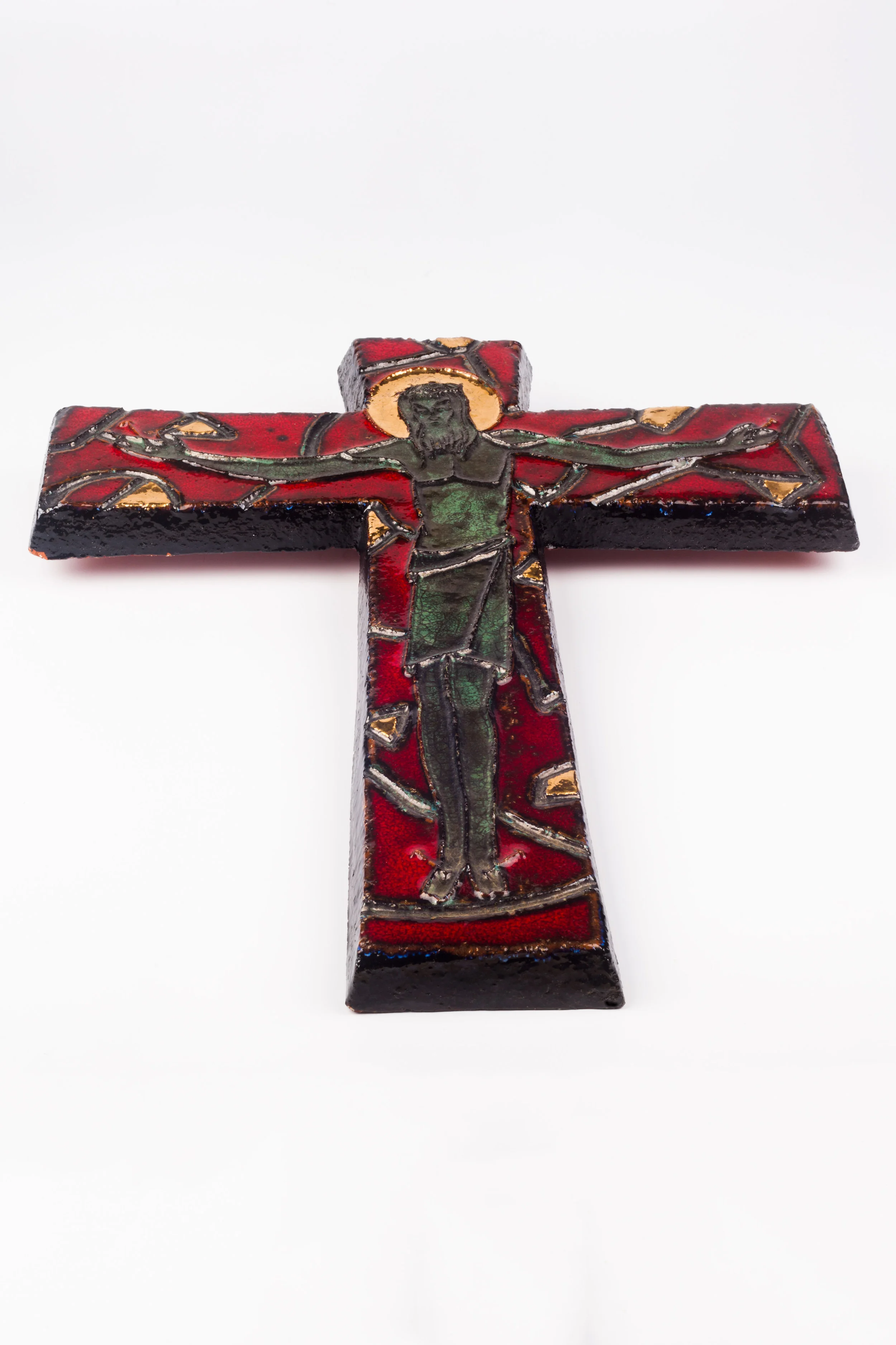 Ceramic red and gilt wall crucifix.