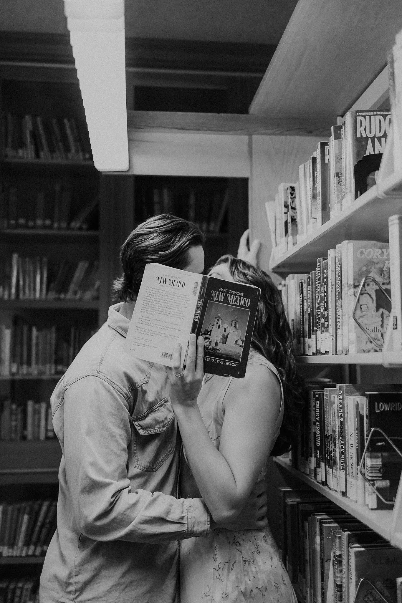 Alicia+lucia+photography+-+santa+fe+engagement+book+shop+engagement+-+library+engagement_0040.jpg