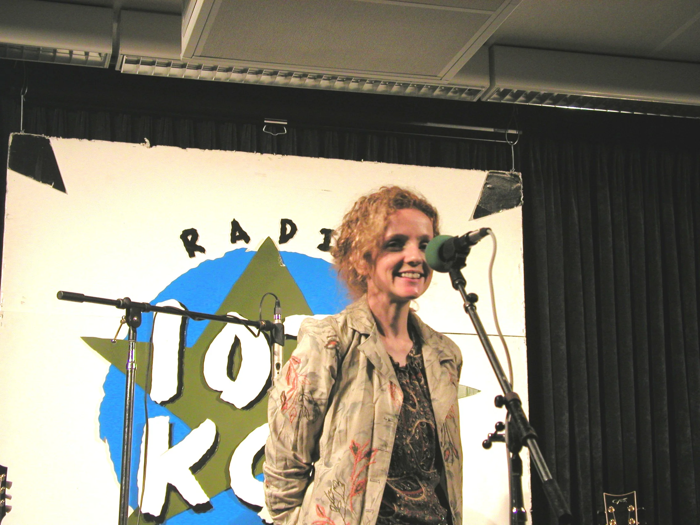 Patty at mic smiling.jpg