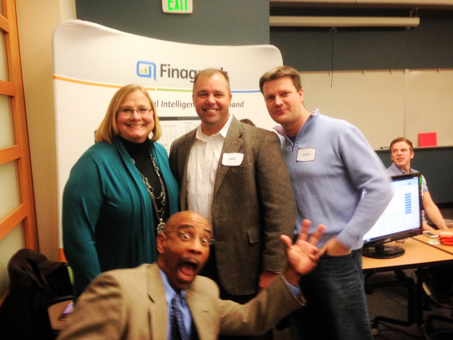 FROM LEFT TO RIGHT: MICHELLE LONG, CPA, MIKE MILAN, SVP OF FINAGRAPH AND JAMES WALTER, CEO OF FINAGRAPH, and robert burns of worldpay