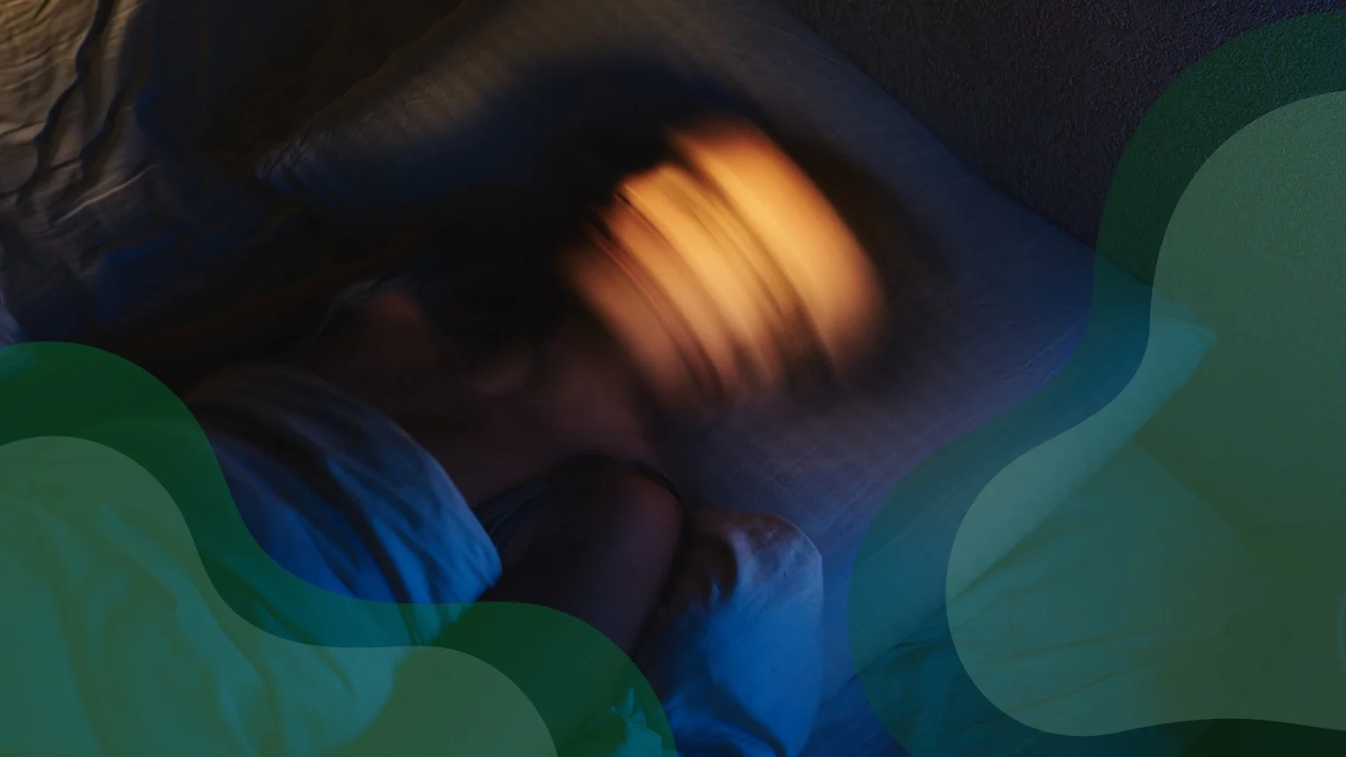 Bezzy-blurred-person-lying-in-bed-tossing-turning-motion-insomnia-1520x855-header.jpg