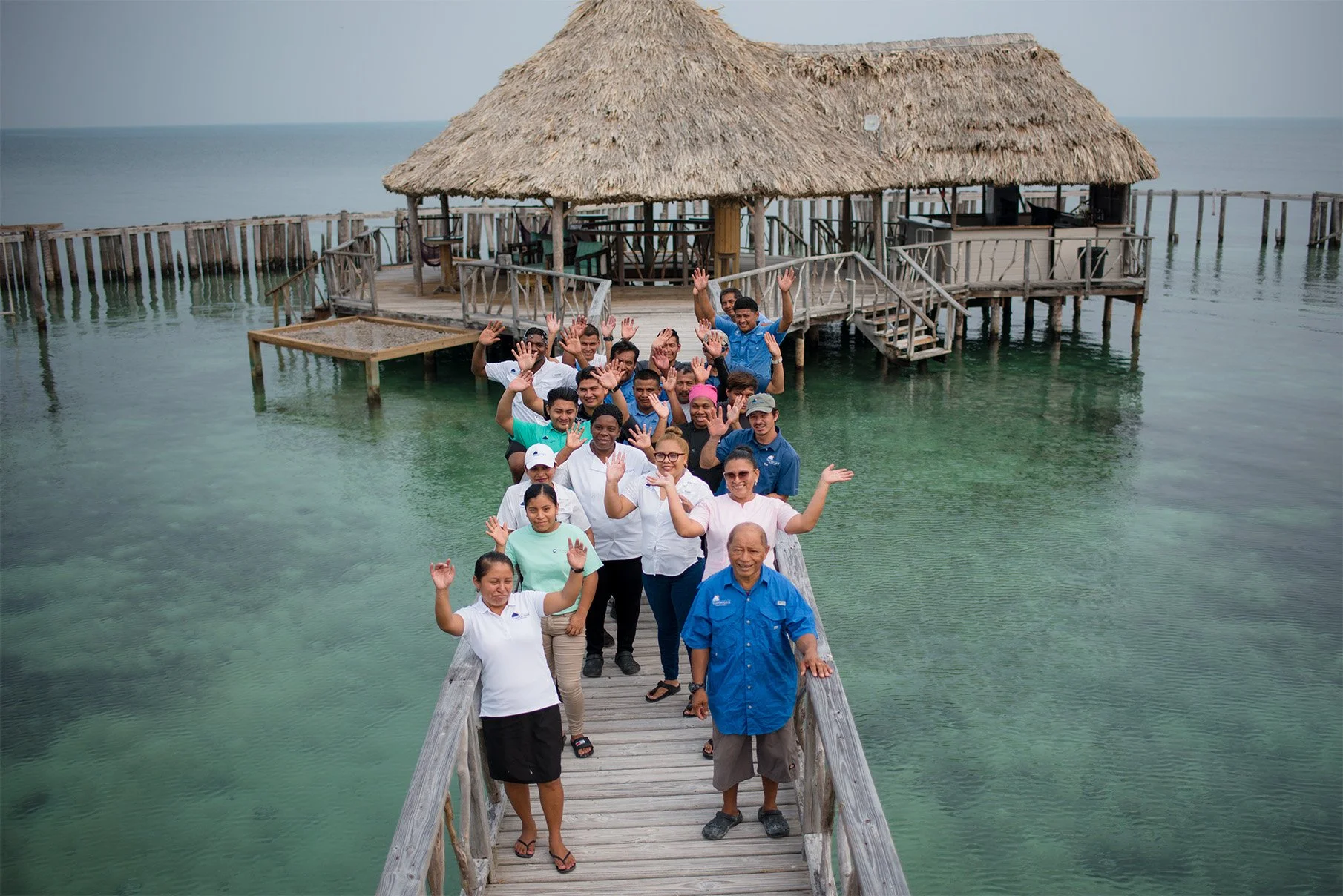 Thatch Caye private island team wave Belize.jpg