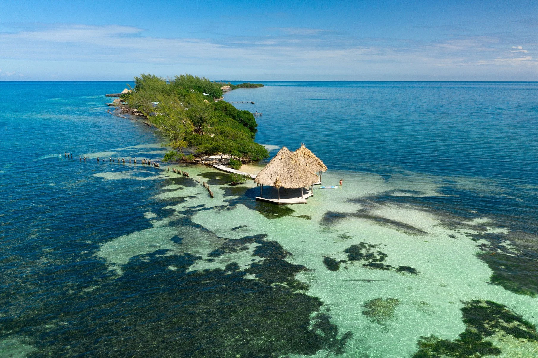 Serenity point Carribean waters on private island Thatch Caye Belize.jpg