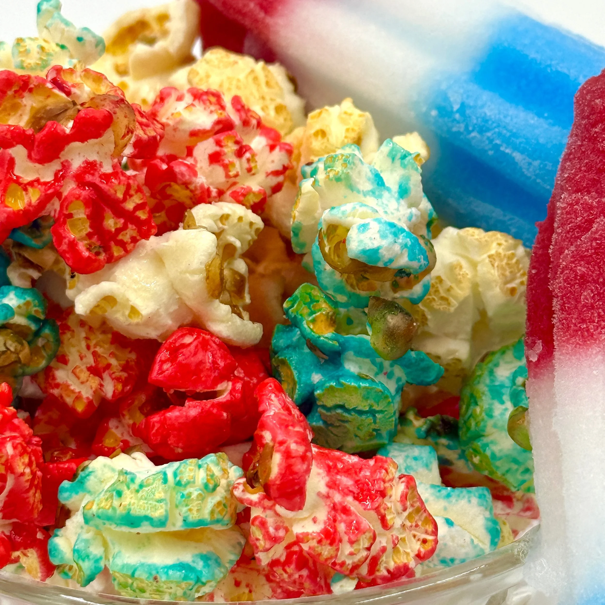 Are you ready for the nostalgic tastes of summer? 🇺🇸

This kettle corn-based popcorn features infused flavors of blue raspberry, cherry and lime for a refreshing POP to your summer treats!
