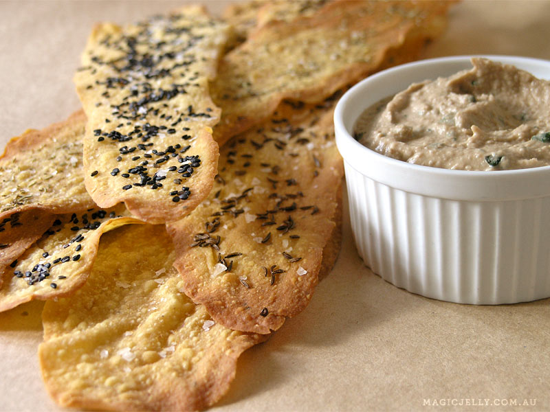 Toasted walnut and basil hummus with incredibly crisp and light olive oil crackers. Cracker recipe here .