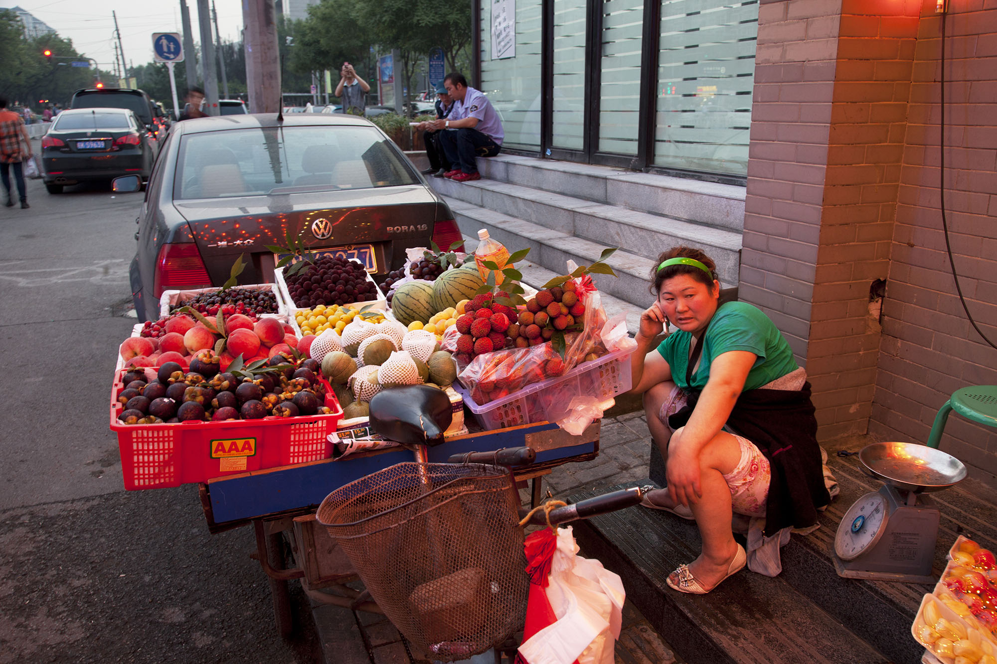  A fruit seller on Guijie food street. 