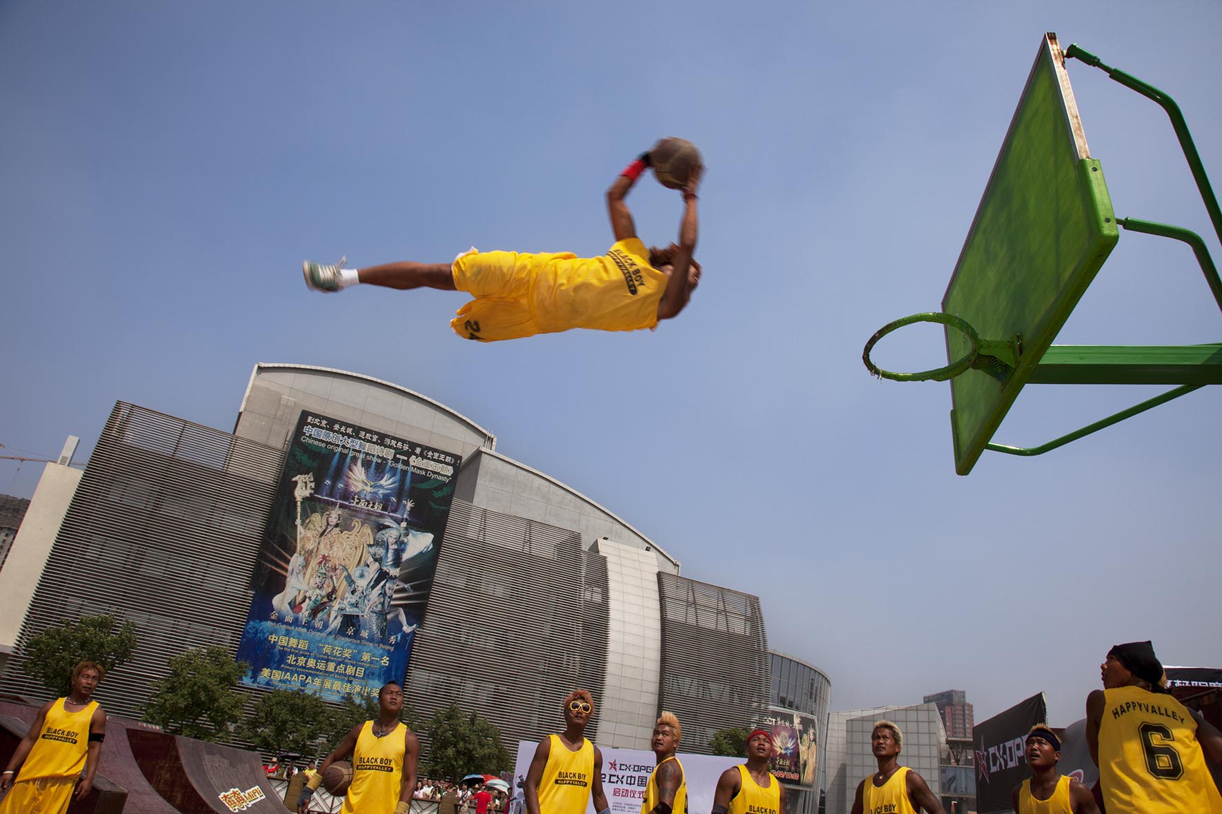  Basketball tricks team perform their slam dunk tricks&nbsp;at Happy Valley amusement park. 