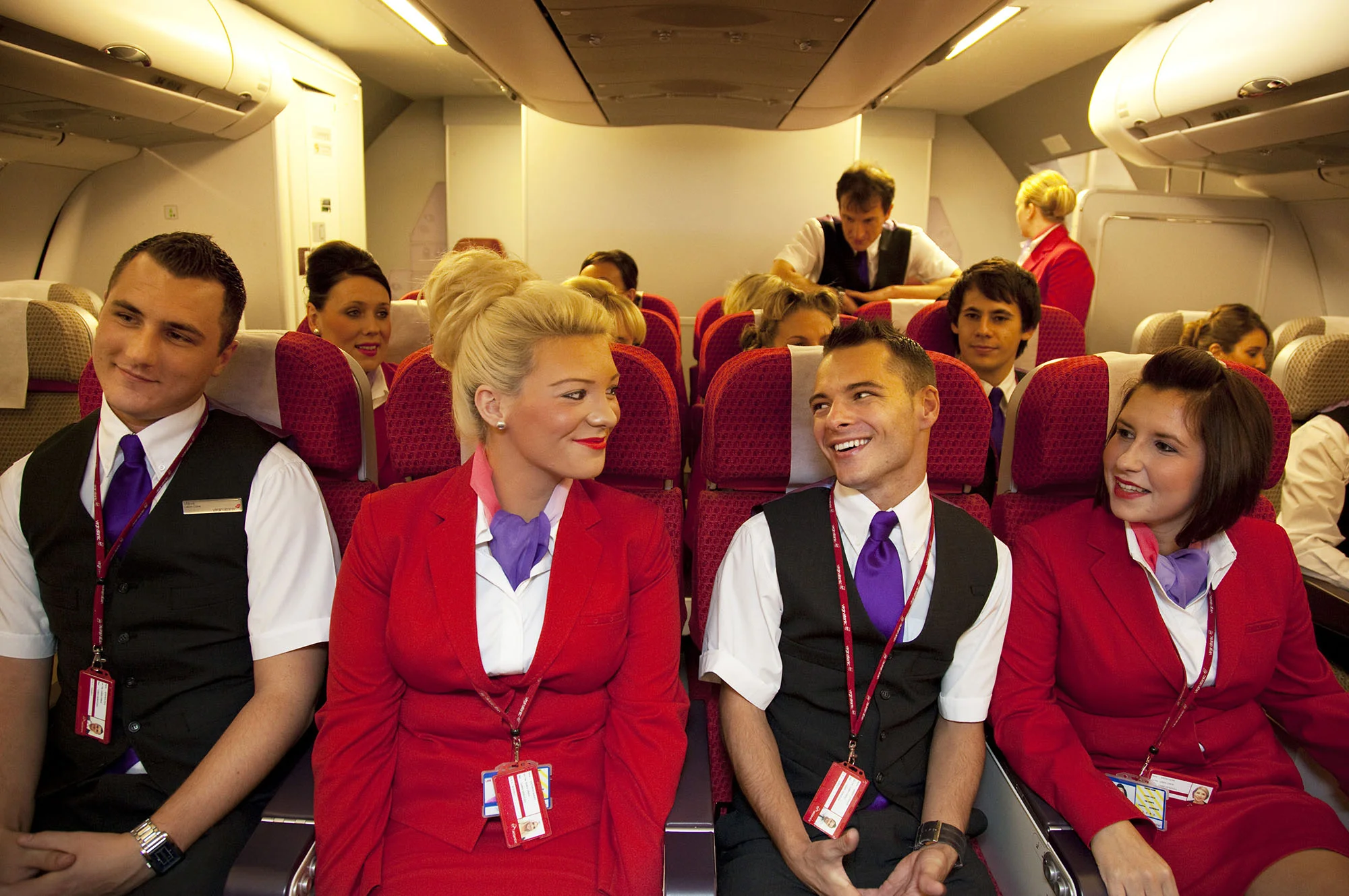 Virgin Atlantic air stewardess and steward training aboard a simulated cabin at The Base training facility, UK. For The Washington Post.
