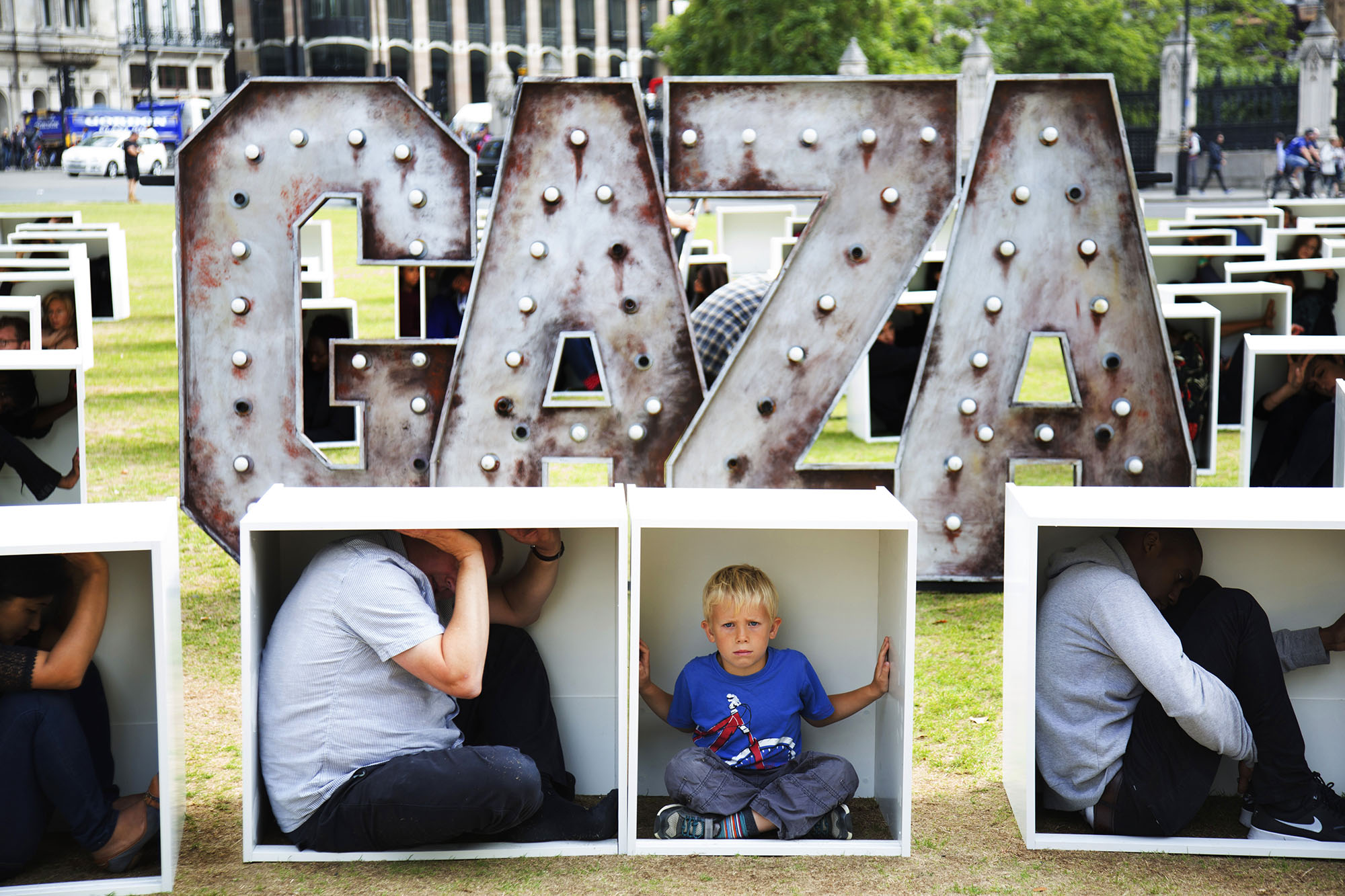  150 men, women and children inside boxes for an Oxfam stunt to illustrate the conditions faced by the people in Gaza who are trapped by the blockade. &nbsp;For Oxfam.  