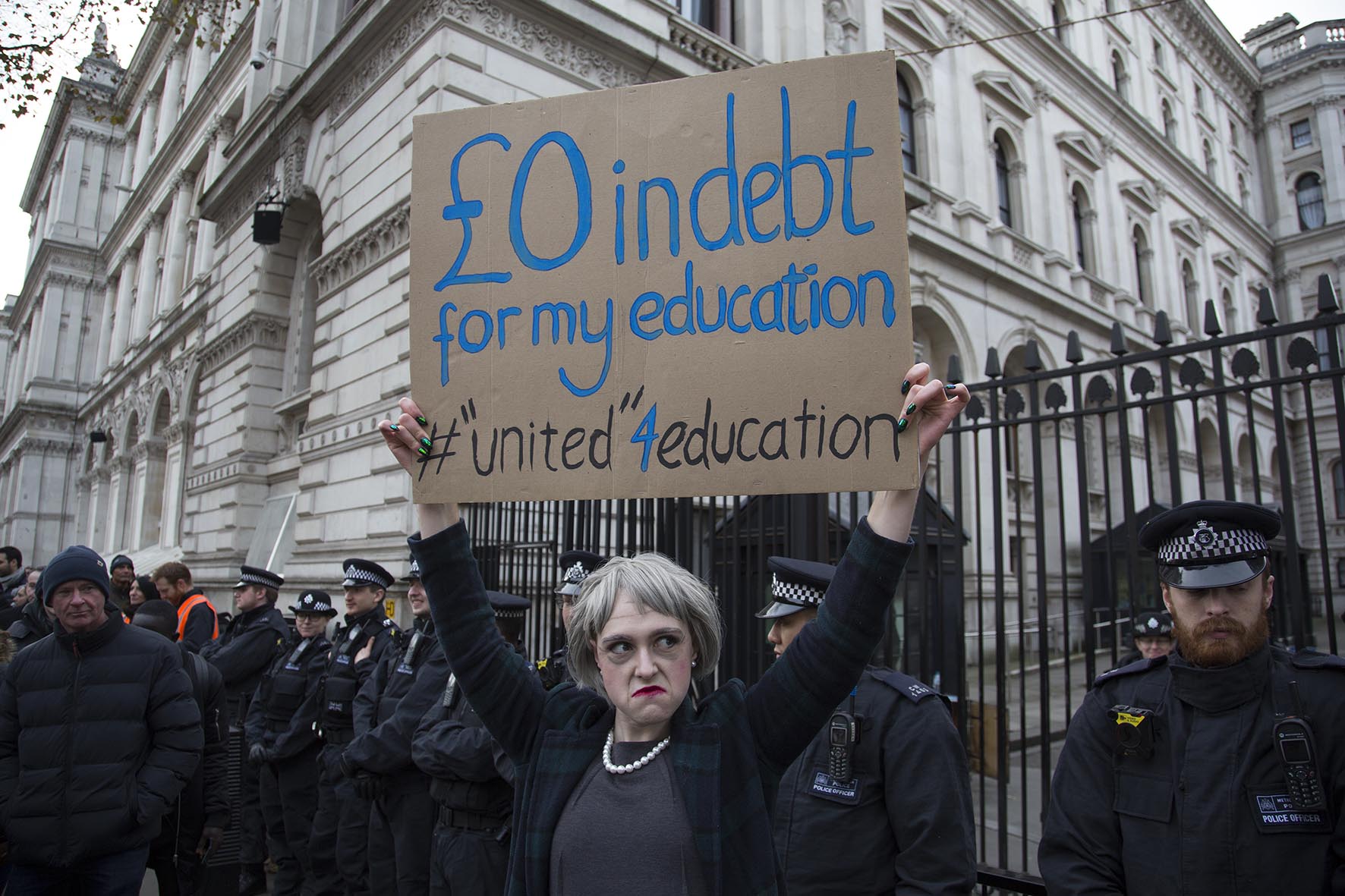  Protester dressed as Theresa May outside Downing Street during student demonstration in London. 