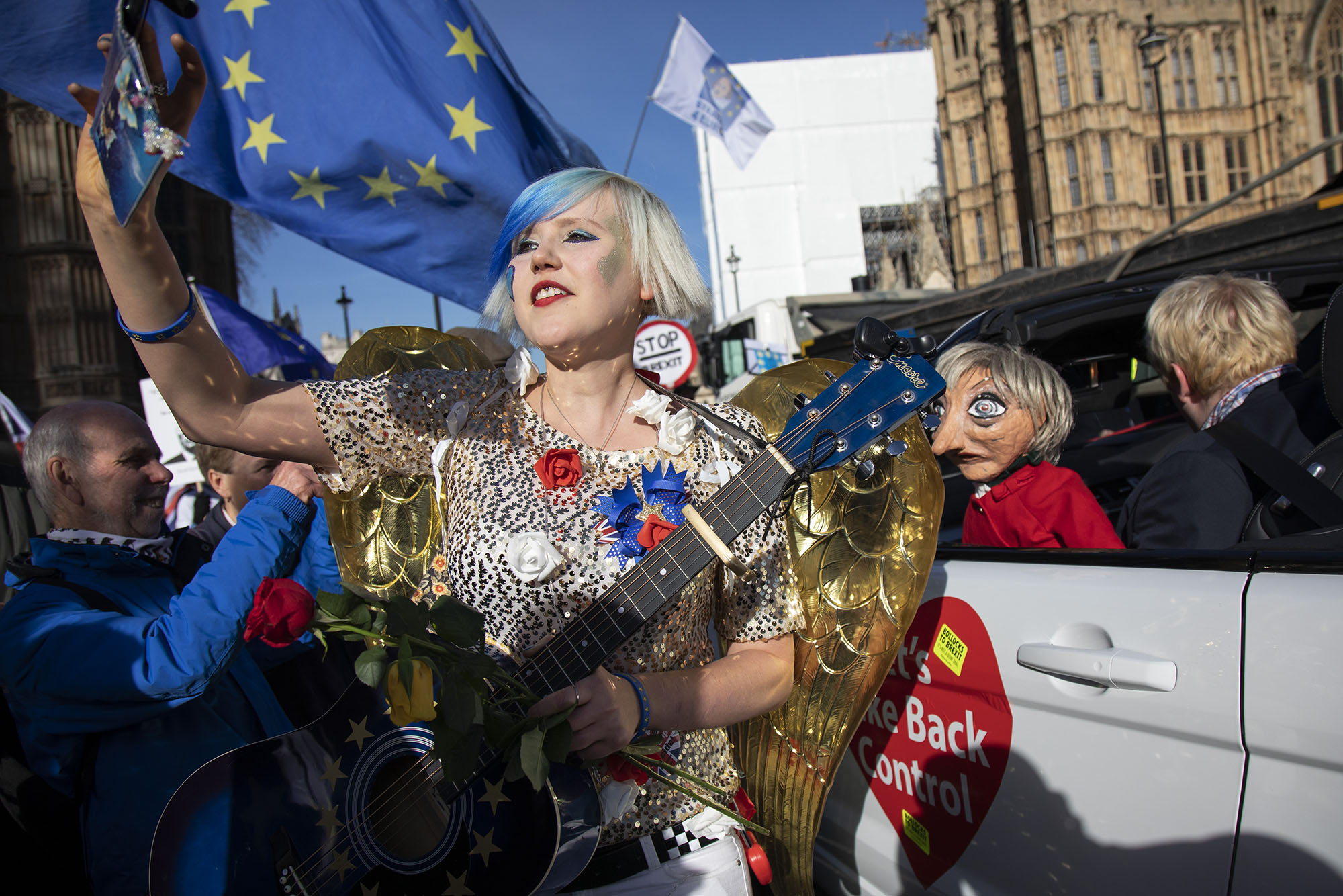  Anti Brexit demonstrator dressed as an angel at the protest opposite Parliament as MPs debate and vote on amendments to the withdrawal agreement plans on 14th February 2019. 
