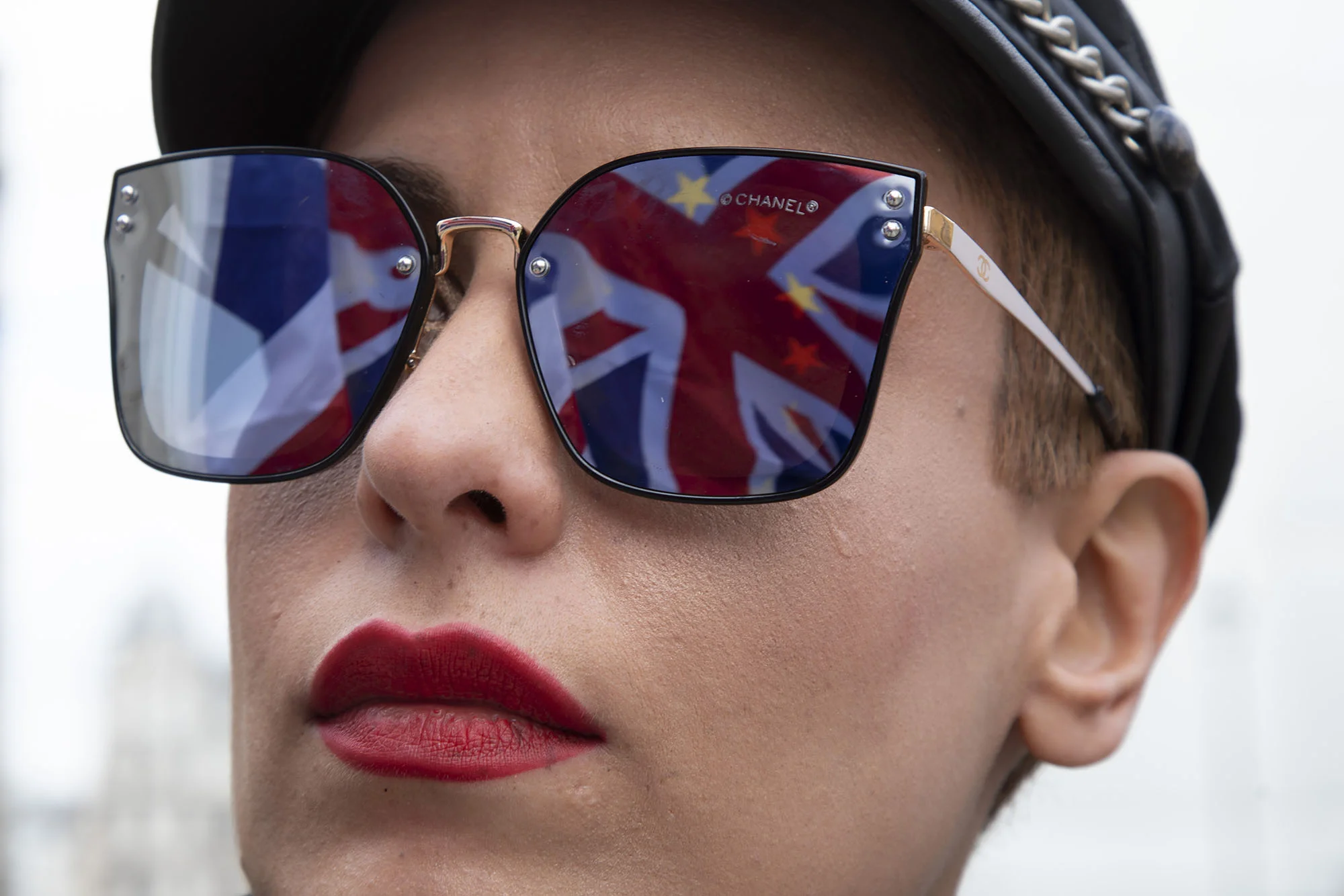 Union flag combined with the European flag reflection in Westminster on 26th March 2019 as the date of the UK leaving the European Union is extended.