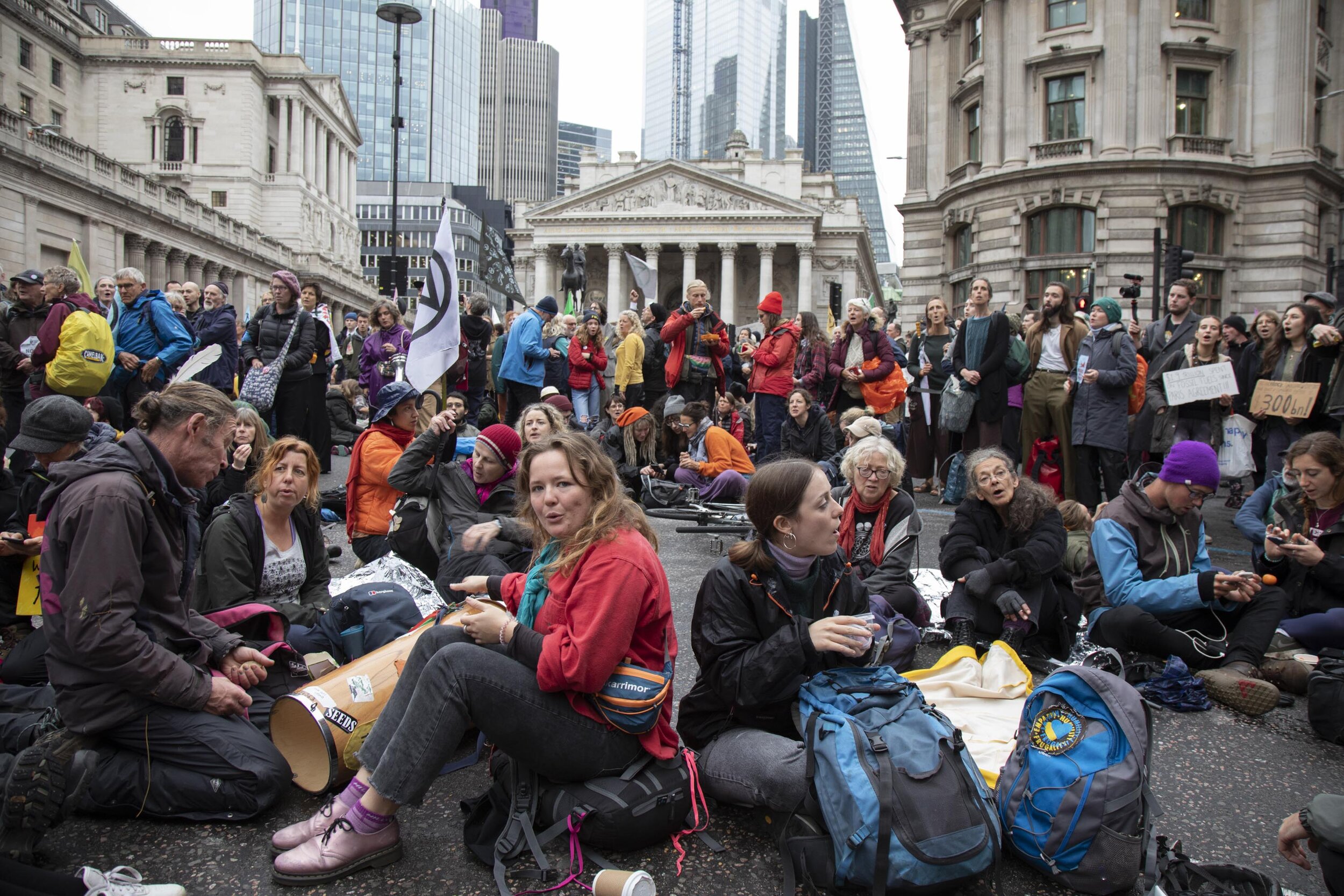  Climate change activists from Extinction Rebellion block the streets at Bank in the heart of the City of London financial district. 