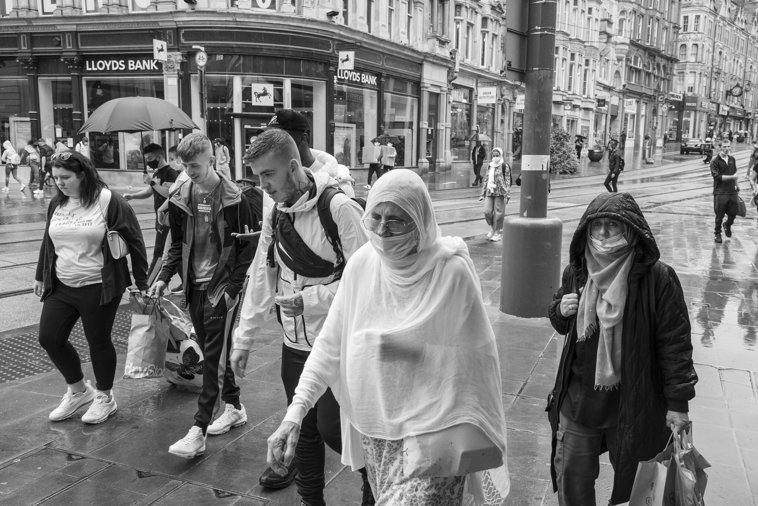  Shoppers in the rain. August 2020. City Centre. 