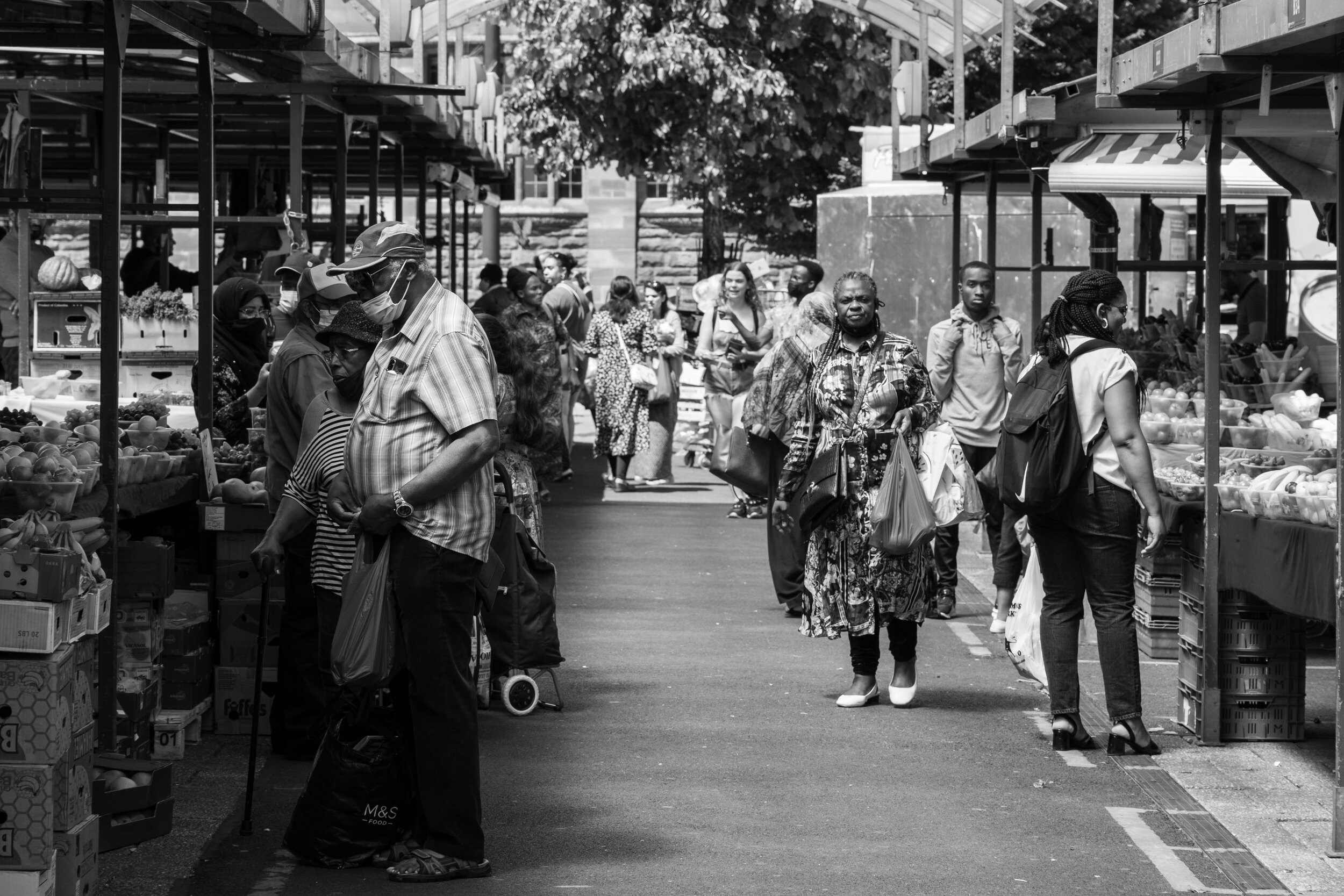  Many more people return to the Open Market to come shopping, however ‘Freedom Day’ is postponed by the government due to the increased numbers of the Delta variant. June 2021. Bull Ring. 