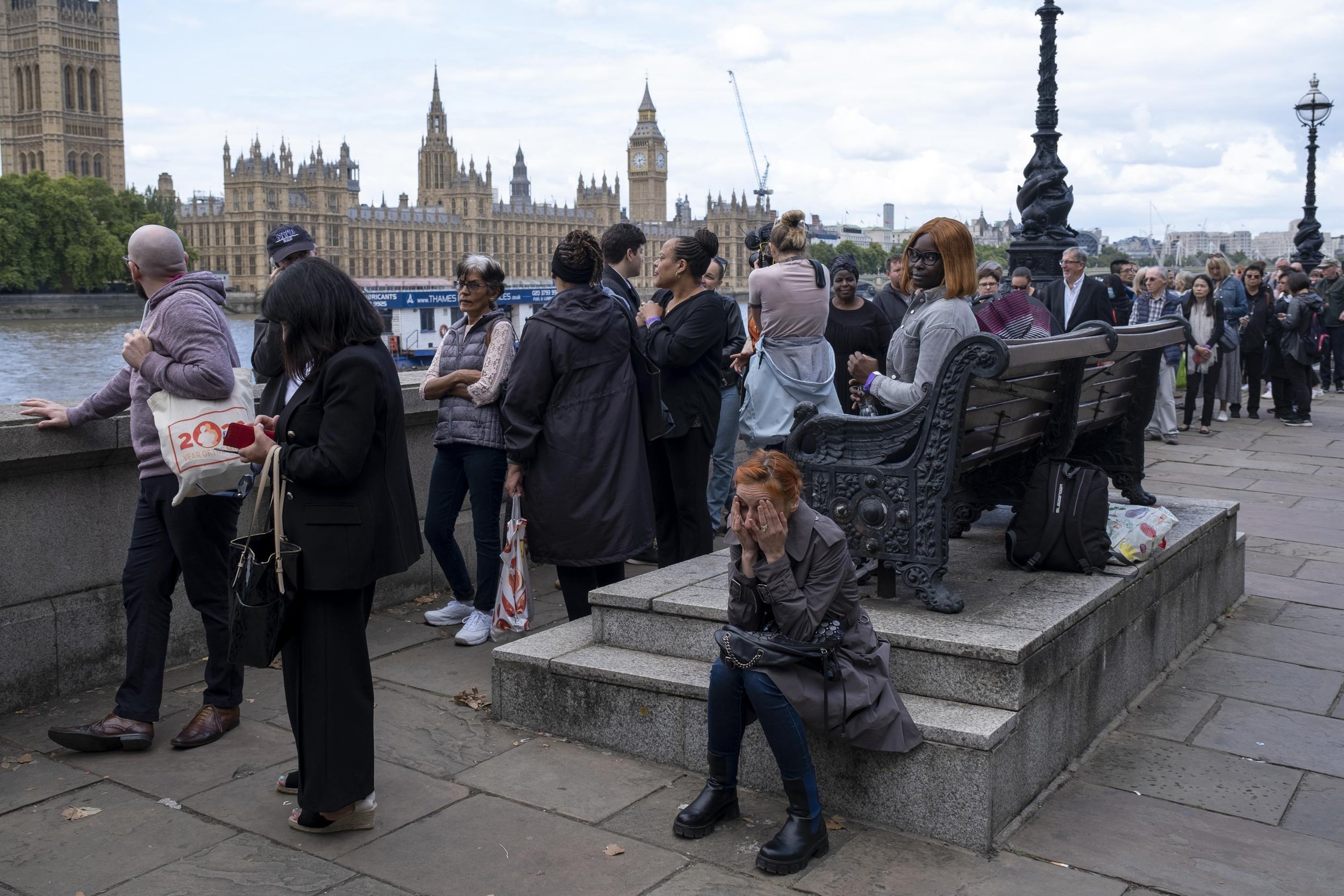  People in the queue to see Queen lying in state near the end of their wait. 