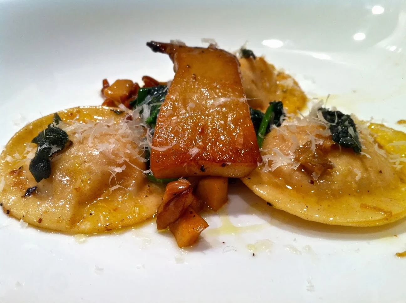 Sweet Potato Ravioli with Brown Butter and Sage  (chile, lime, meringue)