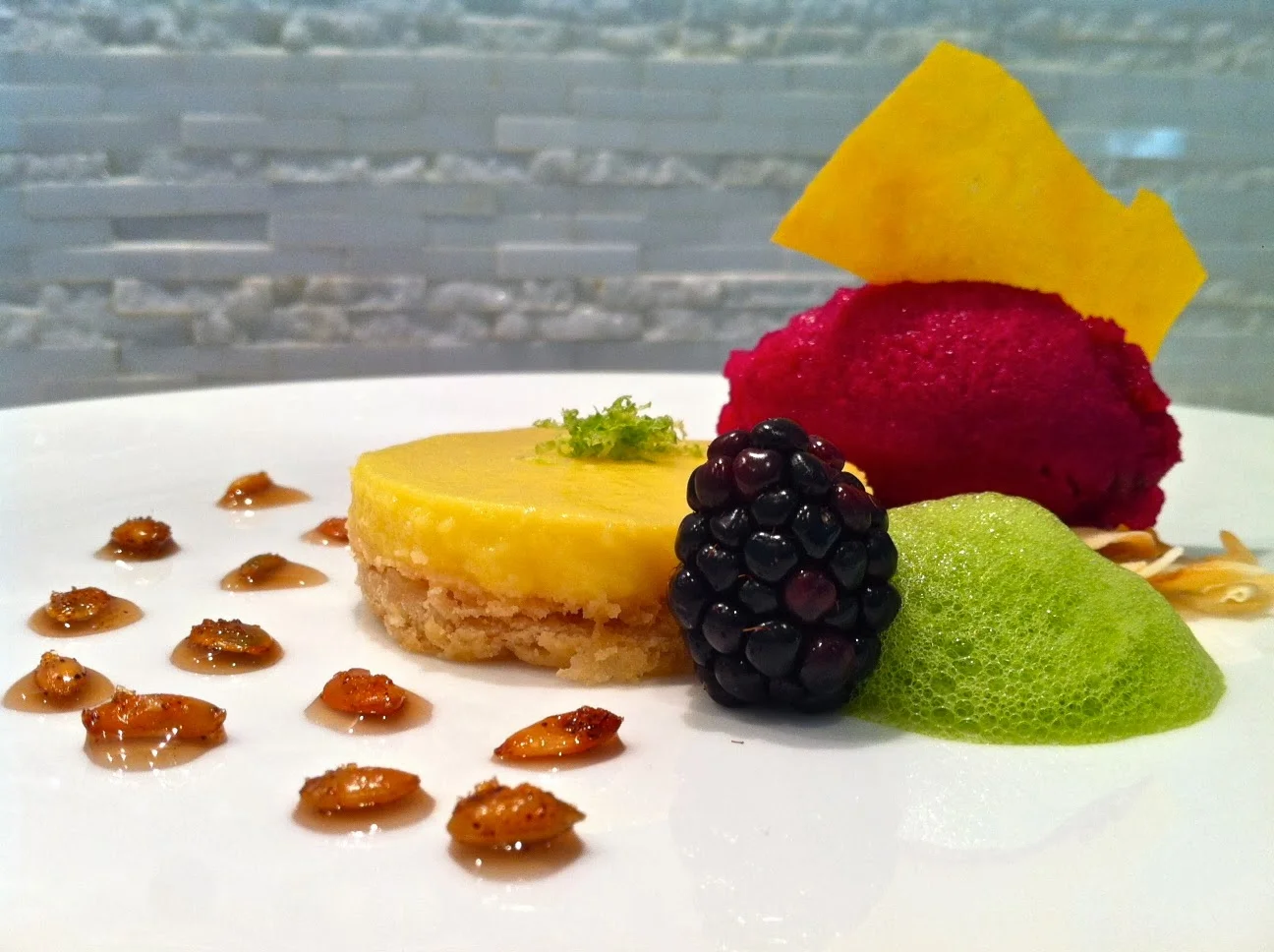 Mango-Coconut Tart with Cactus Pear Sorbet and Spicy Pumpkin Seeds