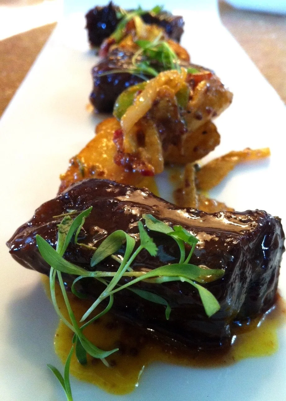 Braised Kobe short ribs with smoked potatoes, fava beans, and home made mustard sauce