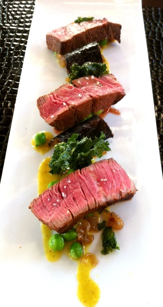 Sous Vide Tenderloin with English peas, Kale, and Corn Curry Sauce