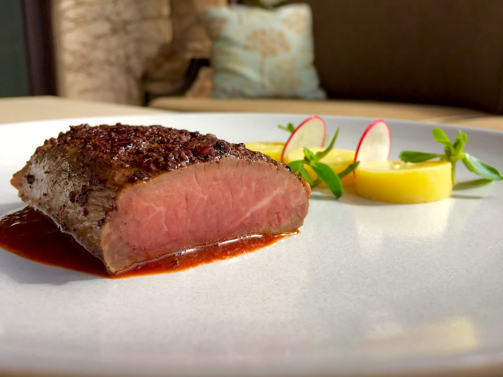 Lamb Loin with Cocoa nibs, Coffee, and Confit Potato 