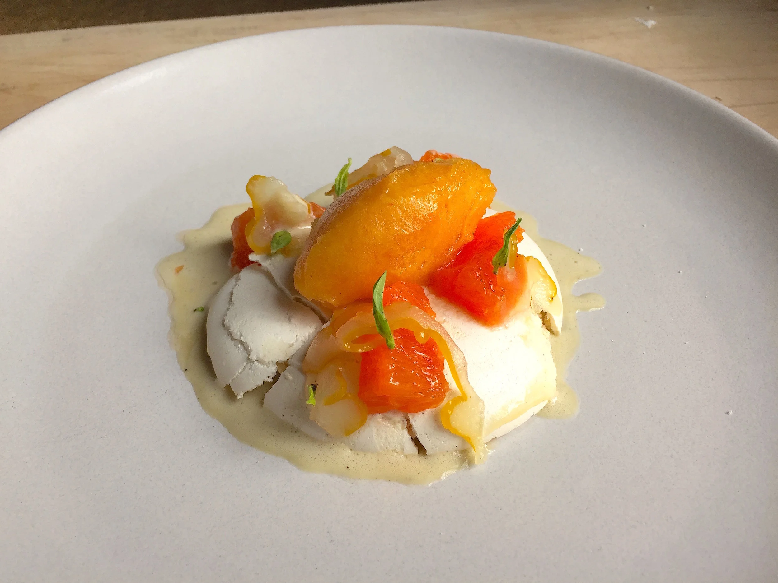 Vanilla Pavlova with Cara Cara Orange and Candied Buddha Hand