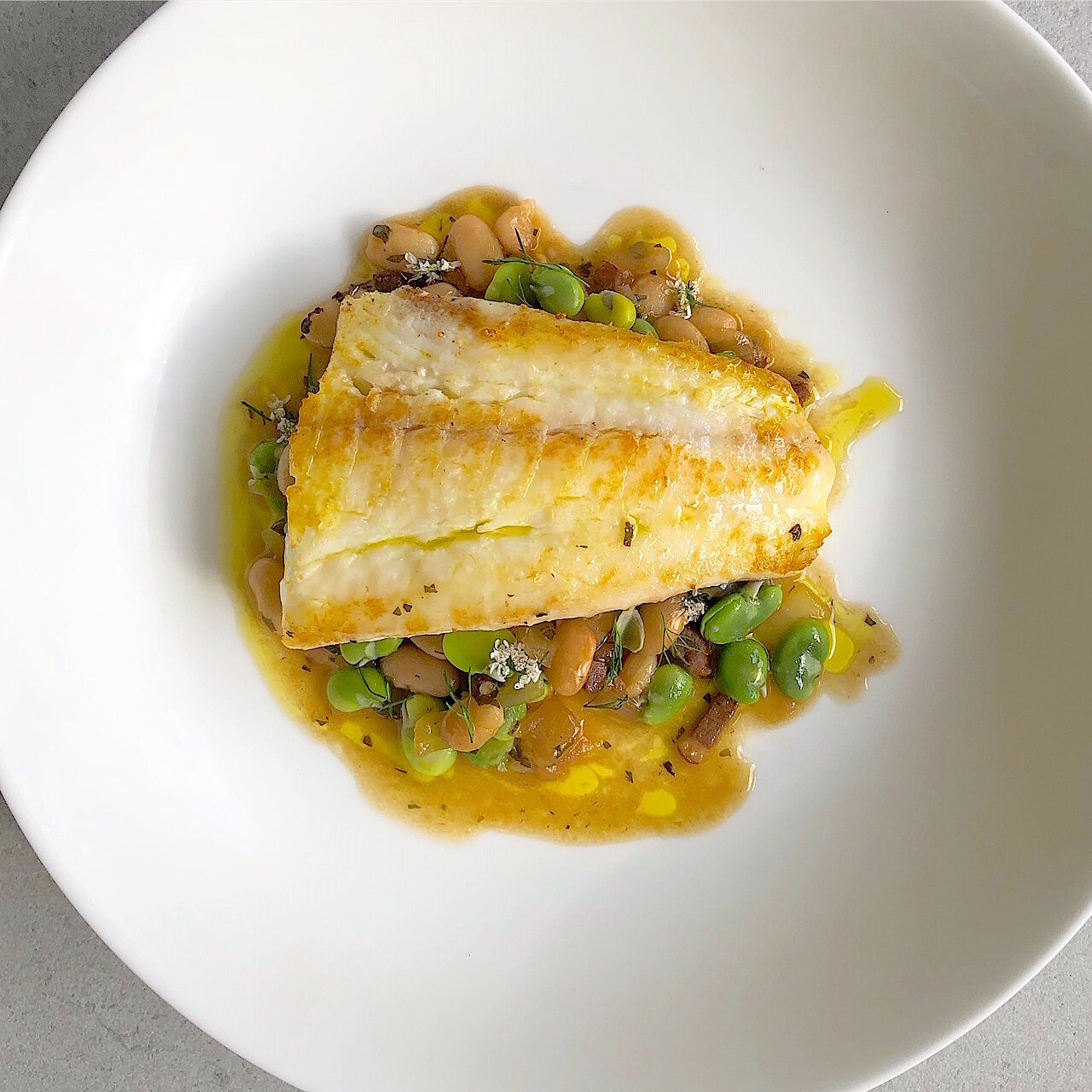 Flounder with Fava, White Bean, and Duck Bacon