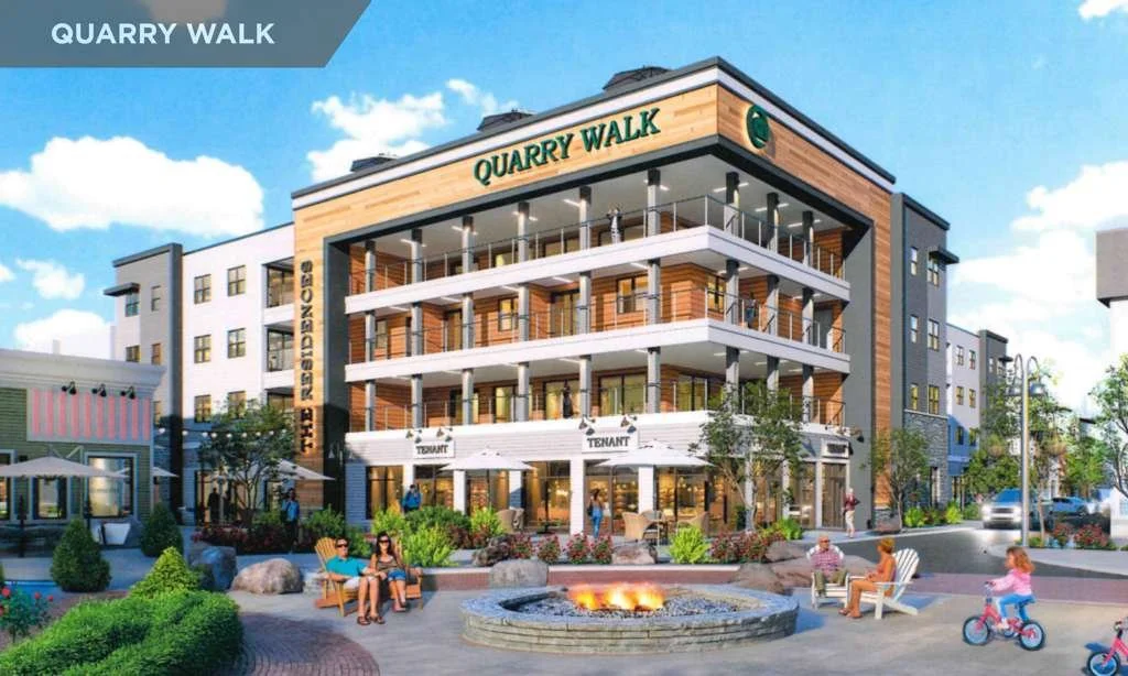 A multi-story residential building labeled 'Quarry Walk' with outdoor balconies, surrounded by a landscaped plaza with people sitting and children riding bikes.
