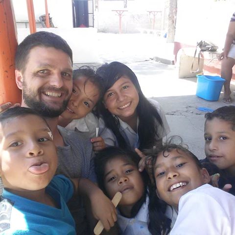 Matt Metzger with some of the children from an orphanage in Mazatlan, Mexico.