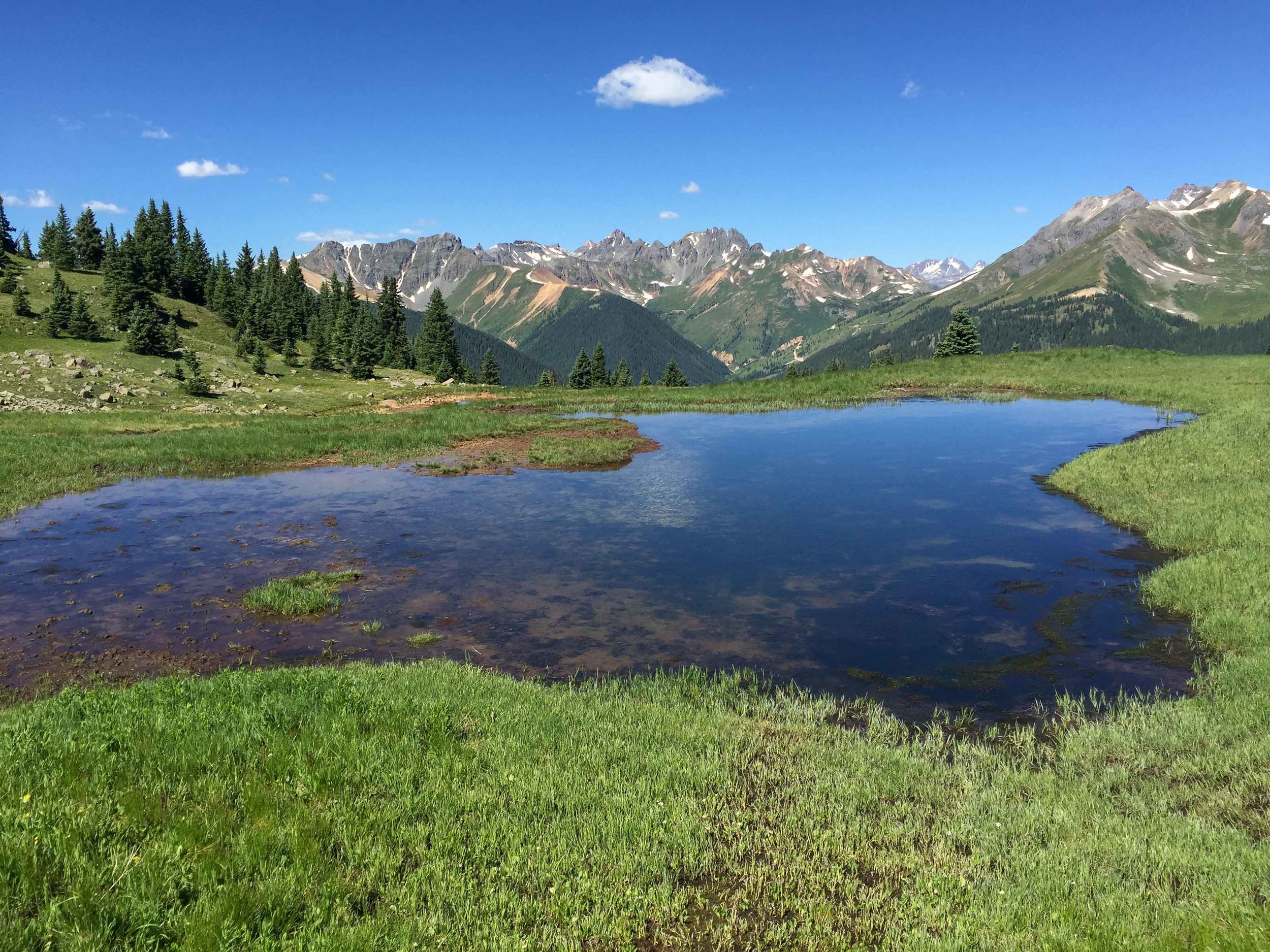 Another pond with a view of the San Juan Mountains