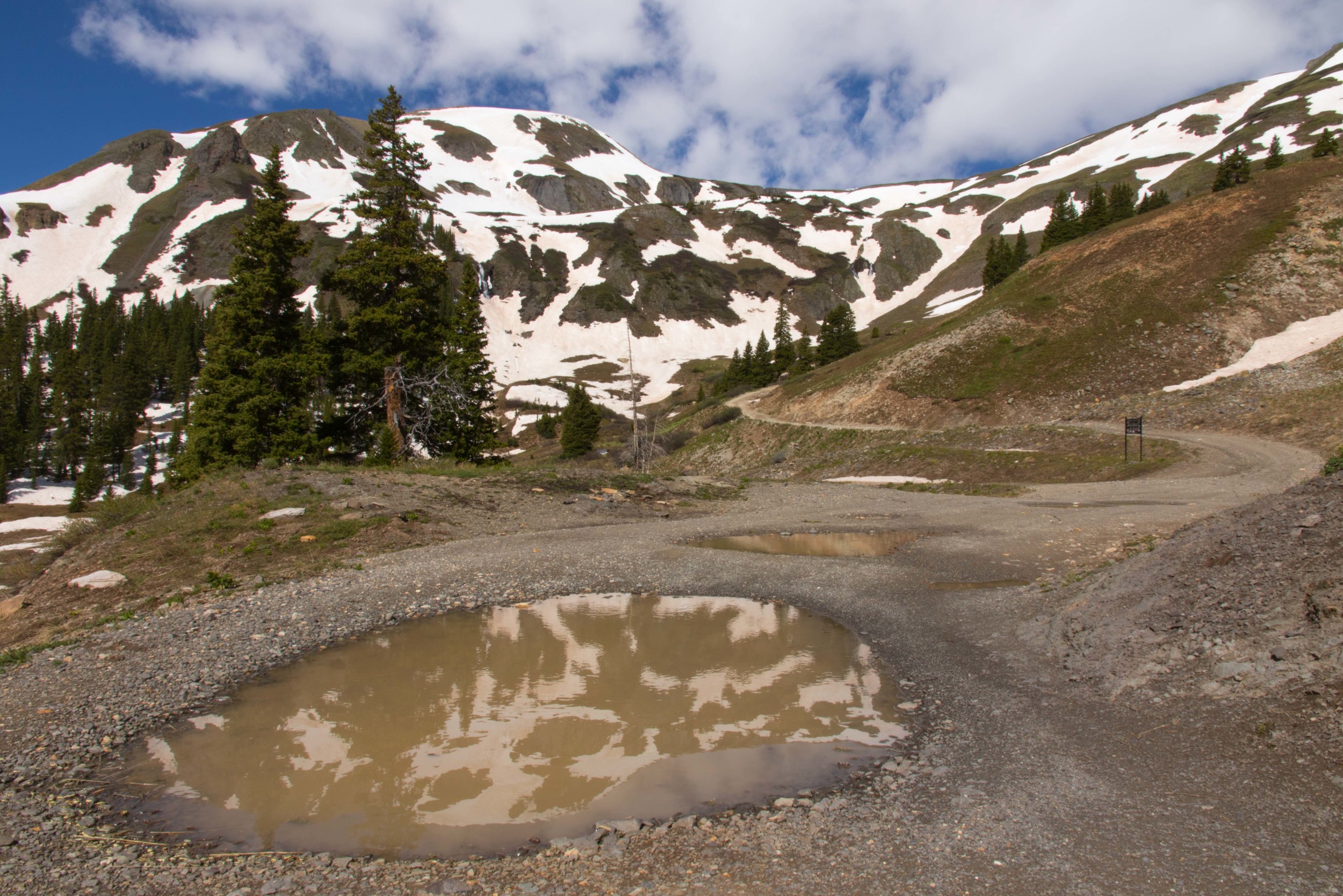 Snowy Reflection in mud puddle, Image#JS_0262
