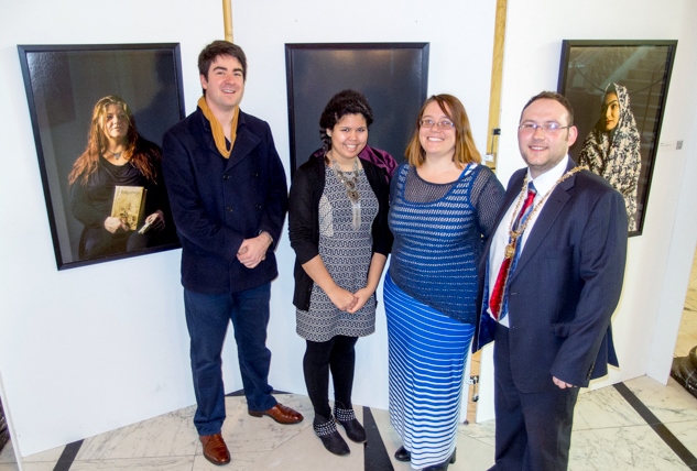 Jasmine (left-centre) with Belonging Project Photographer Laurence Gibson (left), Migrant Centre Advice and Advocacy Manager Jolena Flett (right-centre), and High Sheriff of Belfast Gareth McKee at Belfast City Hall. (Photography credit: Allan Leonard)