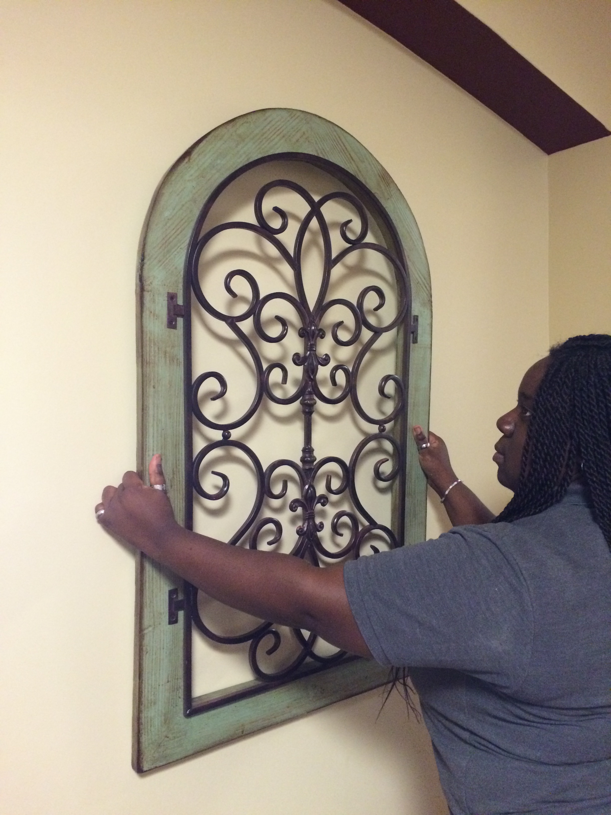 Shernise and I deciding where to place accessories in the corridor.