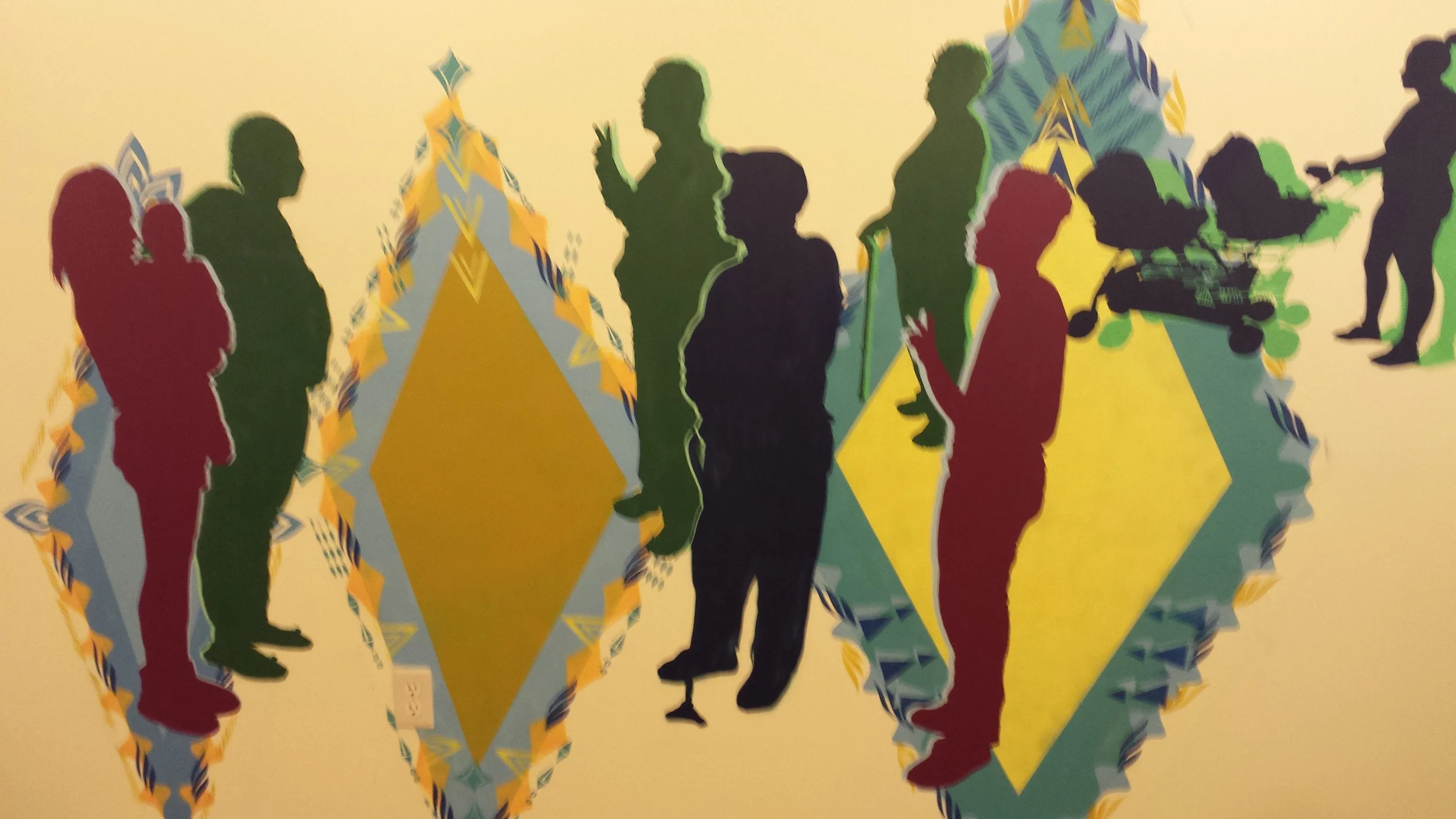 The mural was at the entry and the silhouettes were actual residents.